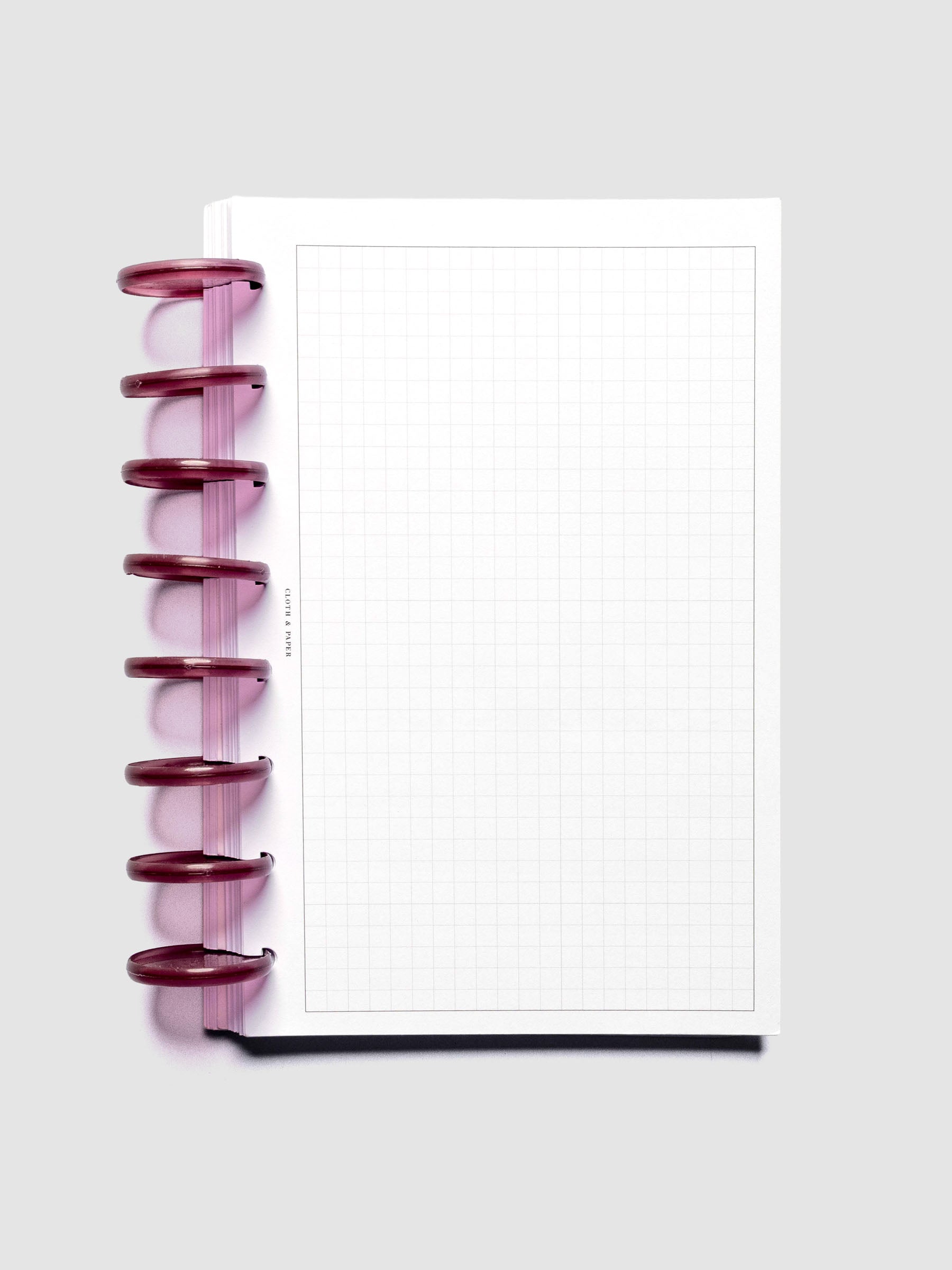 Planner Inserts in size Half Letter fitted onto Transparent Planner Discs | Bordeaux in size 1.5 in.