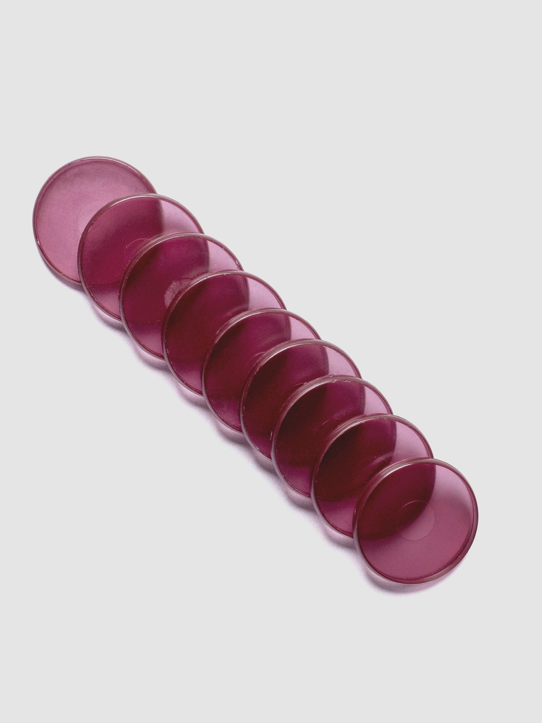 Set of nine transparent, red-hued, planner discs in size 1.5 in.