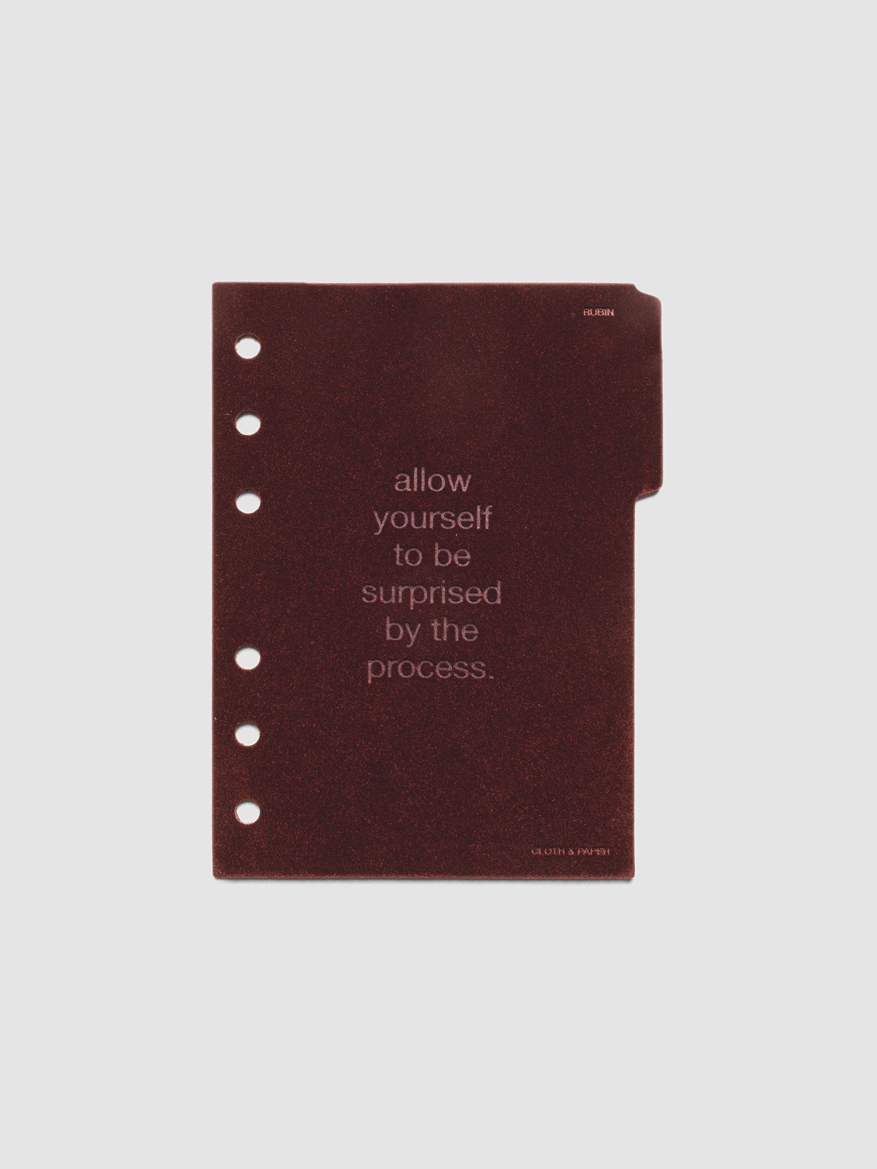 First velvet side tab planners dividers in the color Bordeaux with text deboss design reading "allow yourself to be surprised by the process" in size A6.