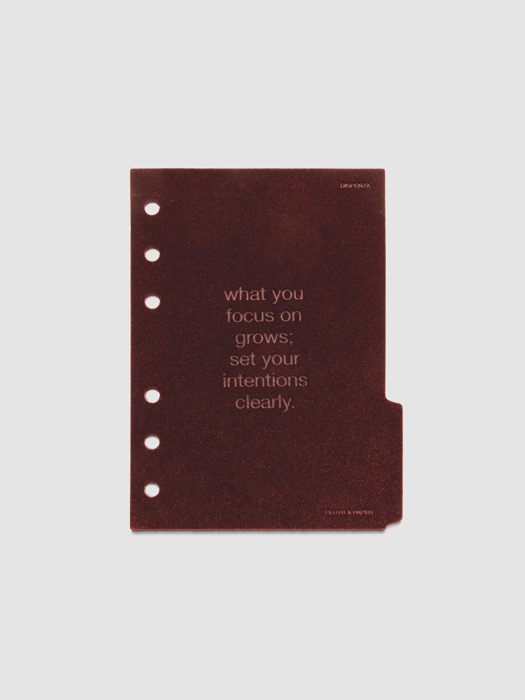 Third velvet side tab planners dividers in the color Bordeaux with text deboss design reading "what you focus on grows; set your intentions clearly" in size A6.