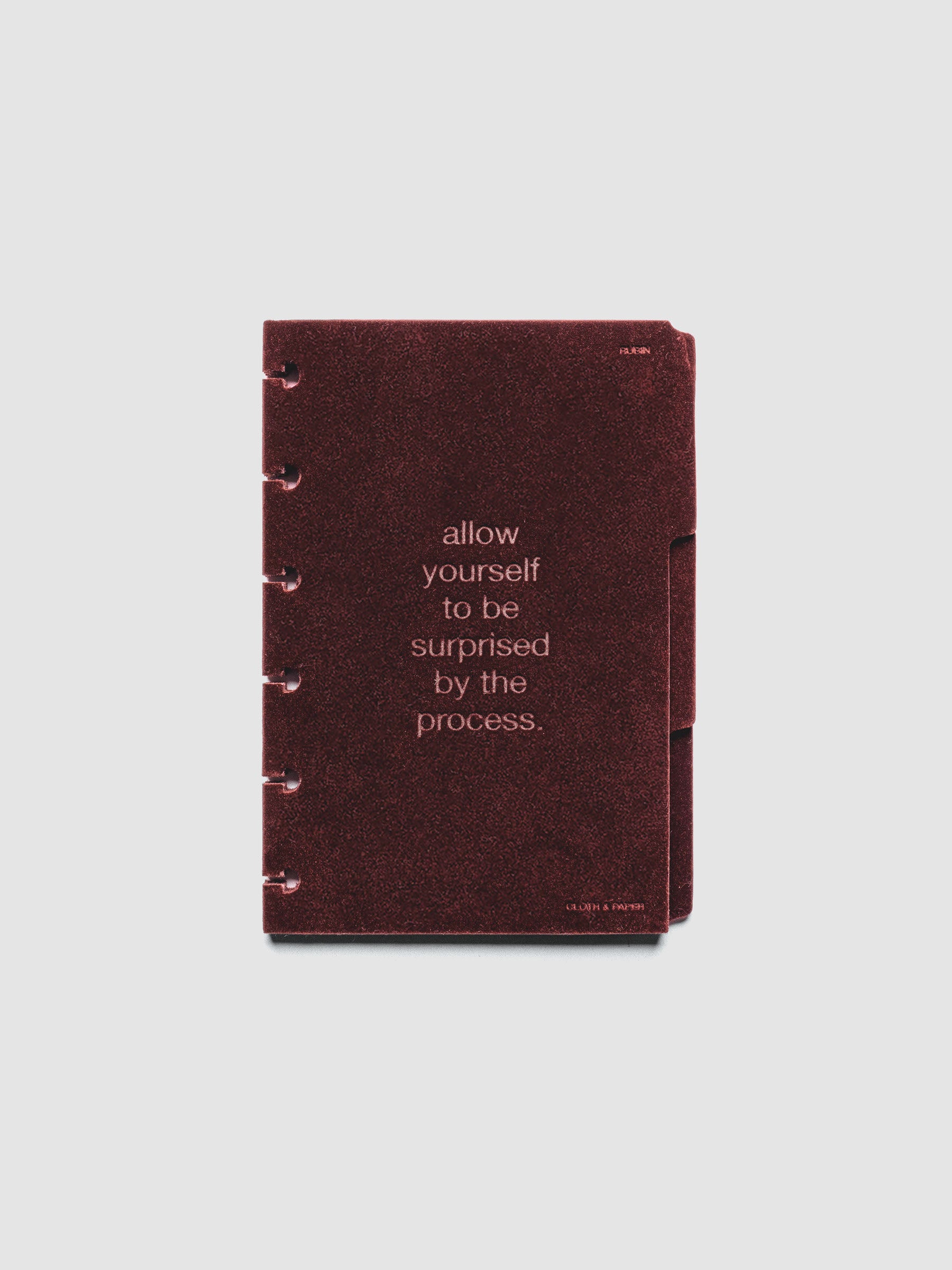 Three velvet side tab planners dividers in the color Bordeaux with text deboss designs shown in size CP Petite.