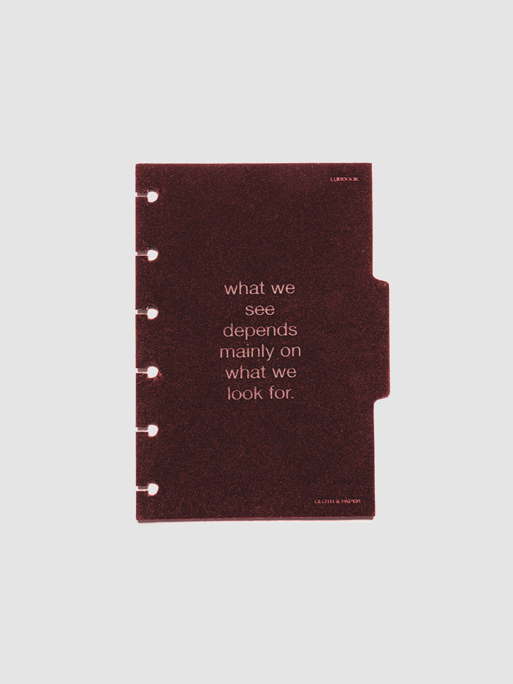 Second velvet side tab planners dividers in the color Bordeaux with text deboss design reading "what we see depends mainly on what we look for" in size CP Petite.