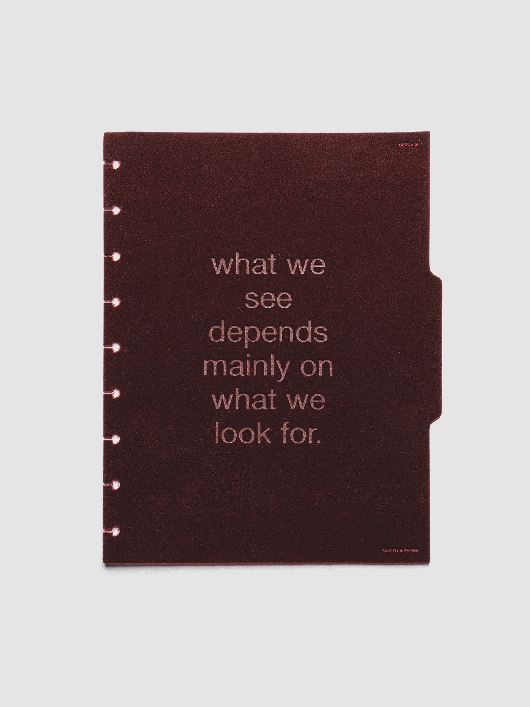 Second velvet side tab planners dividers in the color Bordeaux with text deboss design reading "what we see depends mainly on what we look for" in size HP Classic.