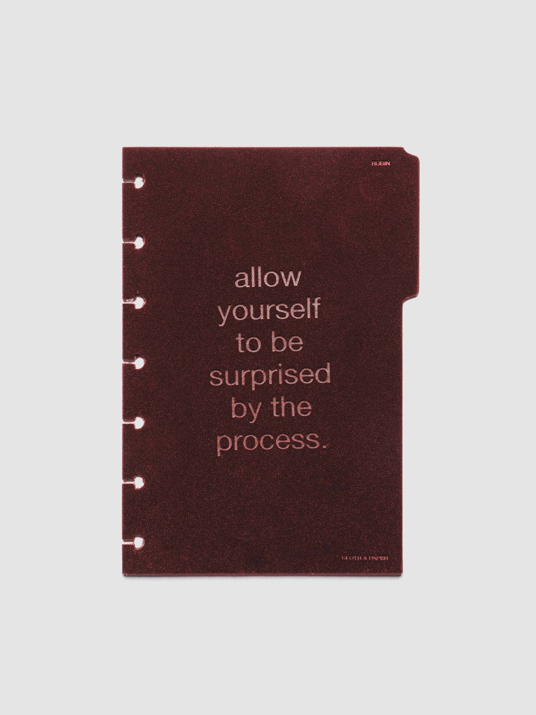 First velvet side tab planners dividers in the color Bordeaux with text deboss design reading "allow yourself to be surprised by the process" in size HP Mini.