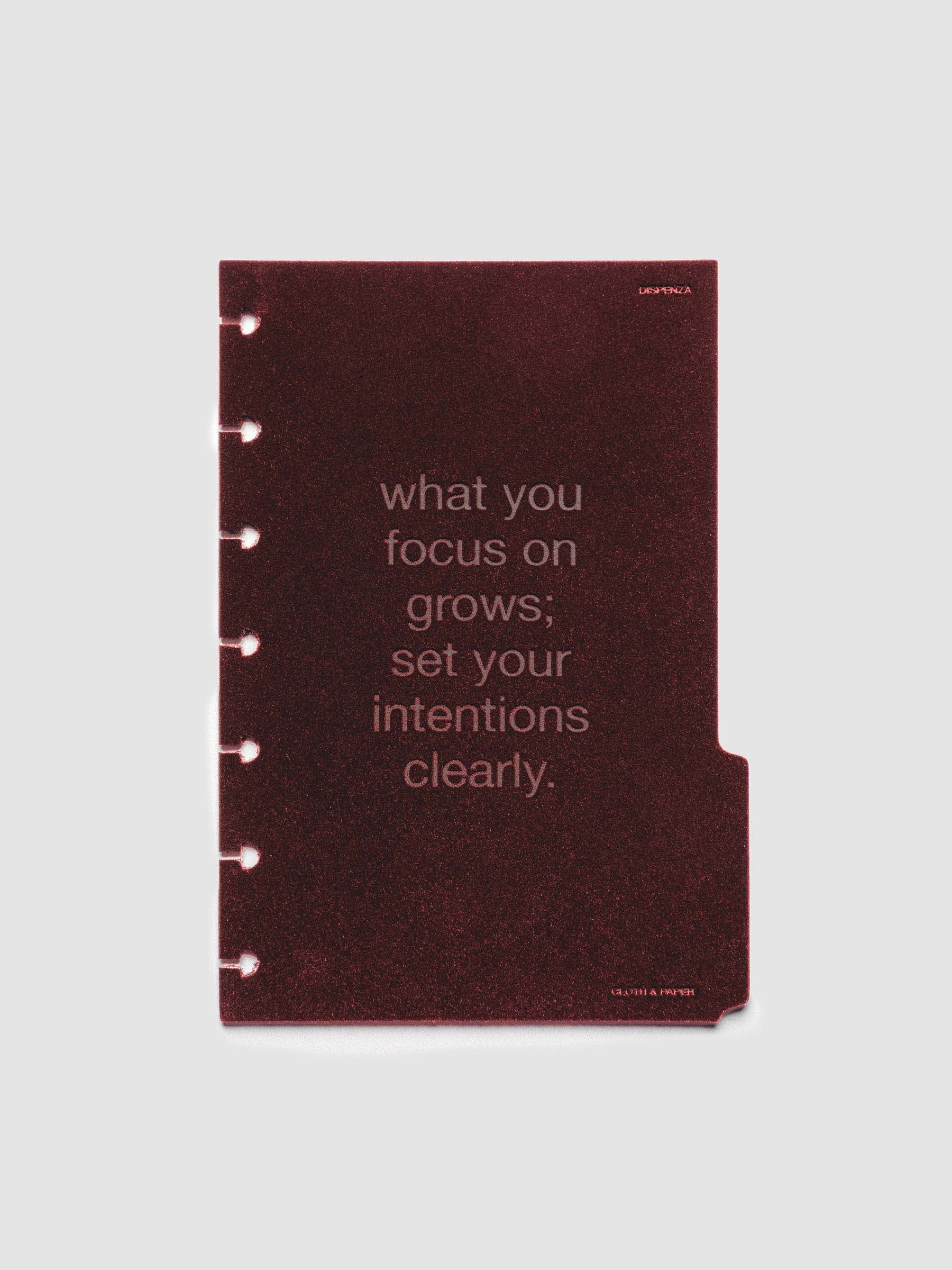 Third velvet side tab planners dividers in the color Bordeaux with text deboss design reading "what you focus on grows; set your intentions clearly" in size HP Mini.