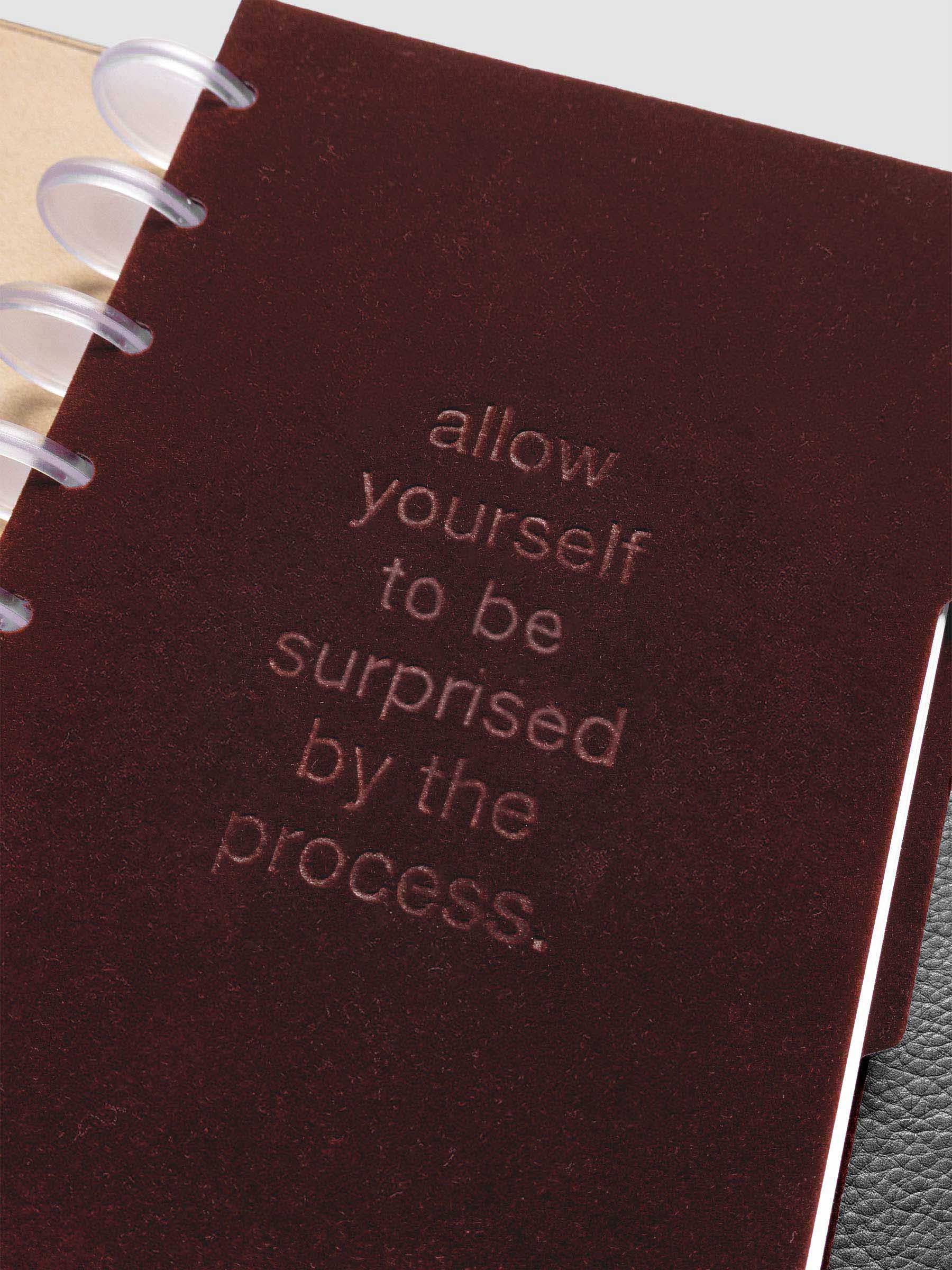 Close up image of the Velvet Side Tab Dividers in size Half Letter shown discbound.