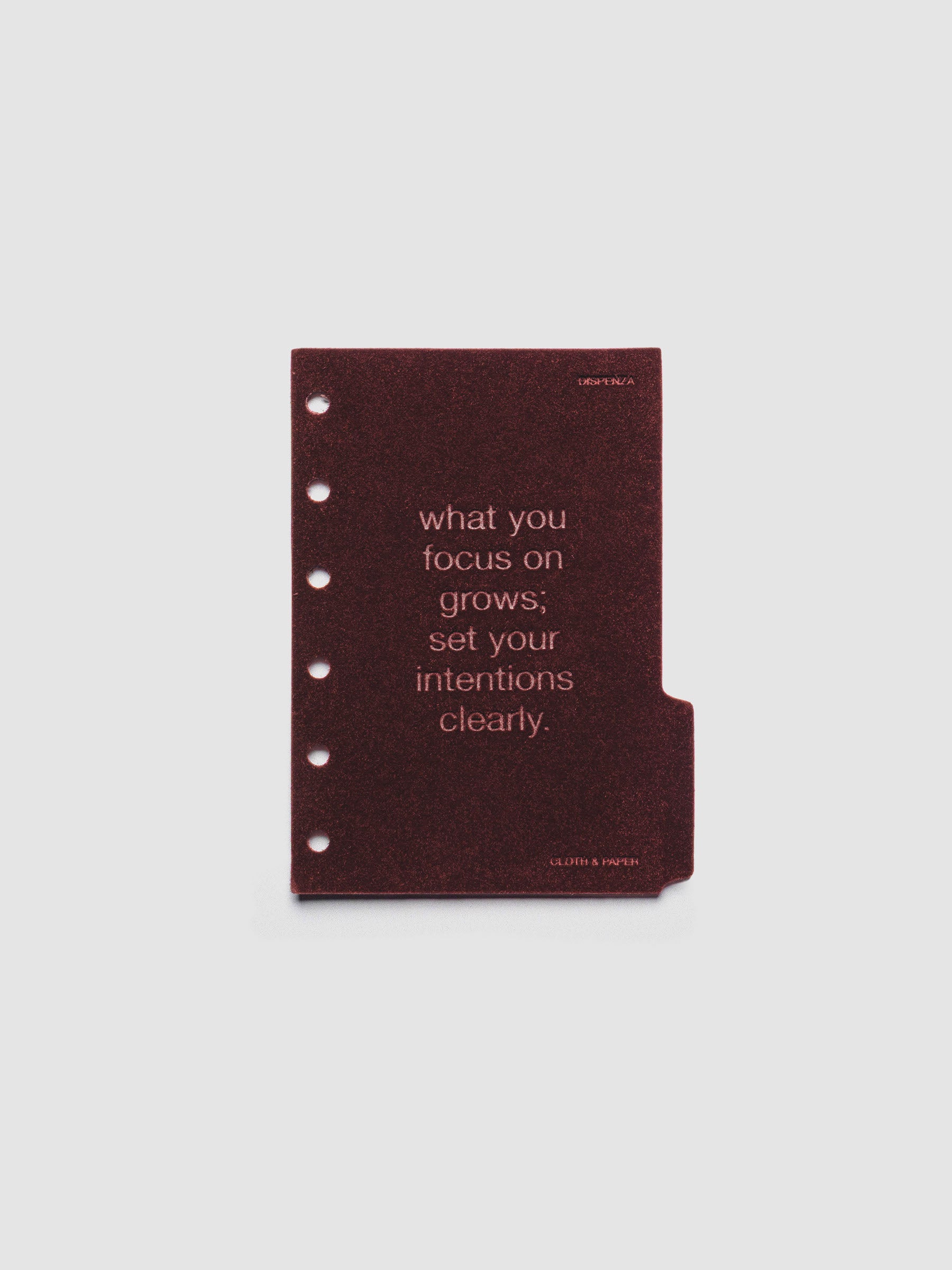 Third velvet side tab planners dividers in the color Bordeaux with text deboss design reading "what you focus on grows; set your intentions clearly" in size Pocket.