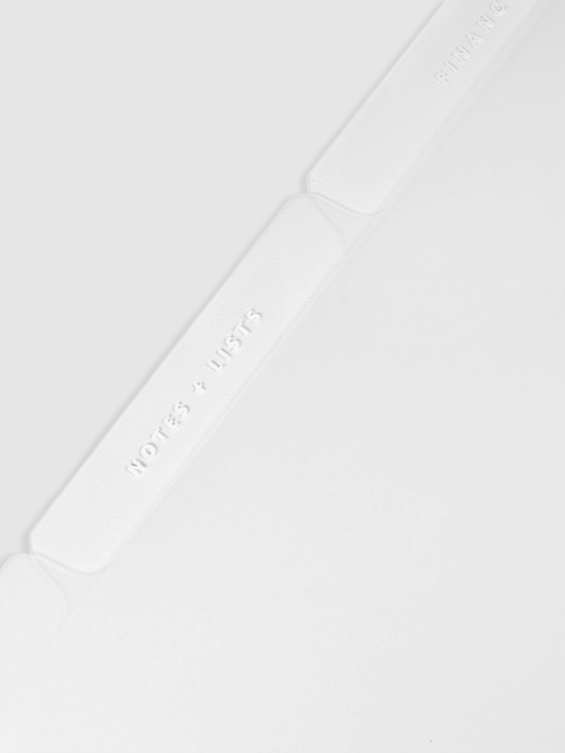 Closeup of the White Essentials Side Tab Planner Dividers Glass Plastic.
