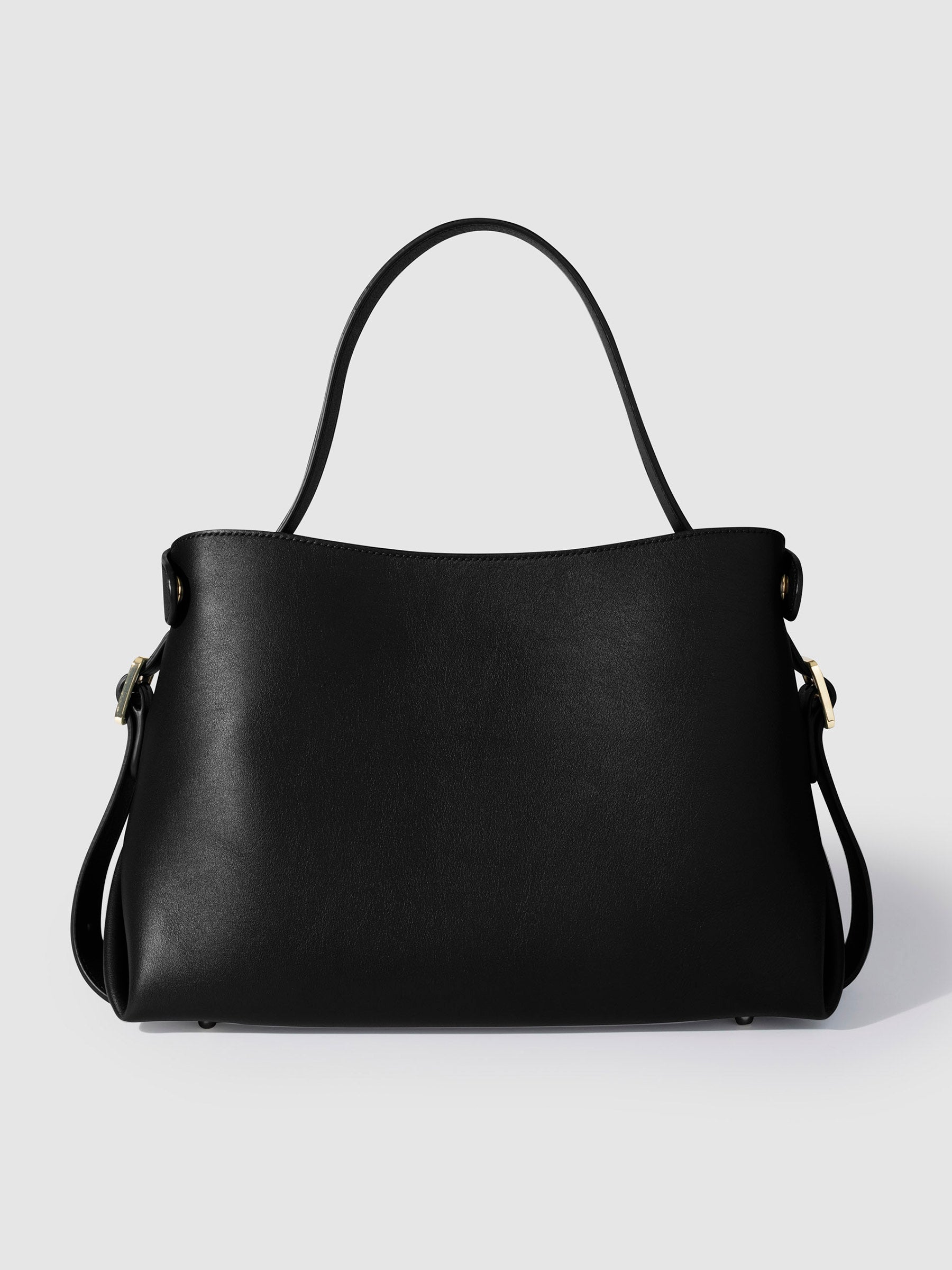 Leather bag displayed on a neutral background. Color shown is Padrillo.