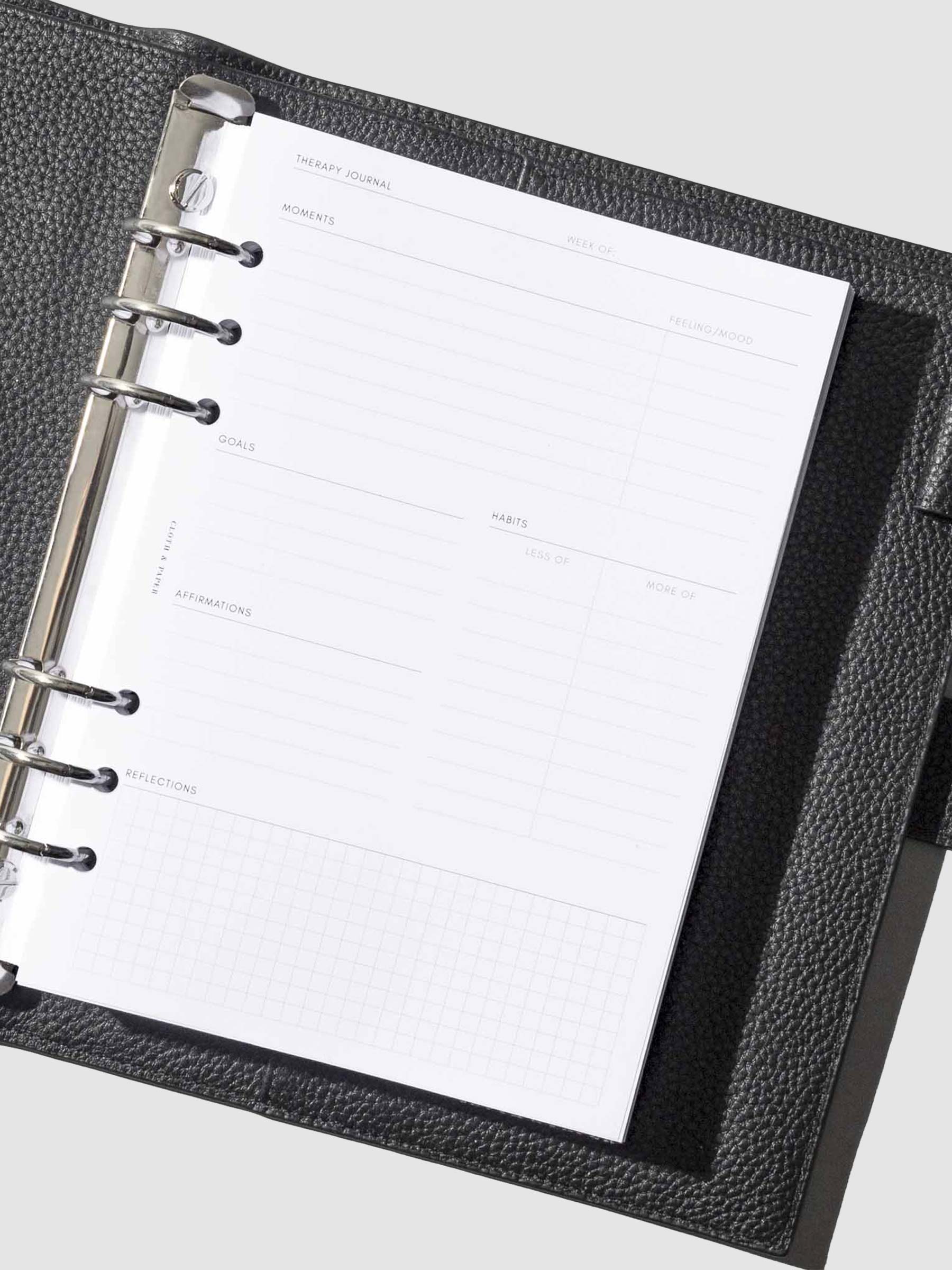 Insert shown in use inside a black leather agenda. Size shown is A5.
