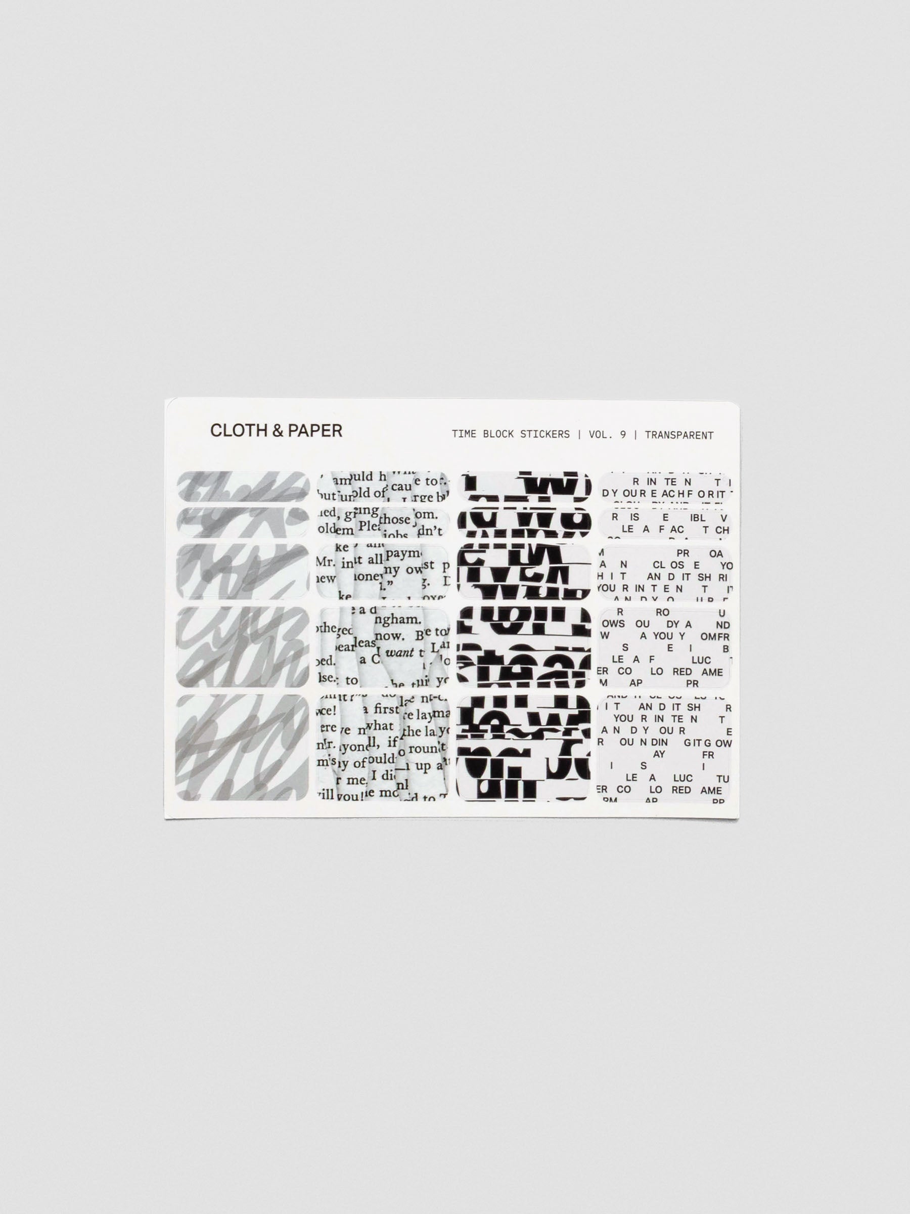Cloth & Paper Time Block Stickers Vol. 9 in transparent. A single sheet featuring rectangular stickers in layered black-and-white designs, including script, bold type, and text patterns.