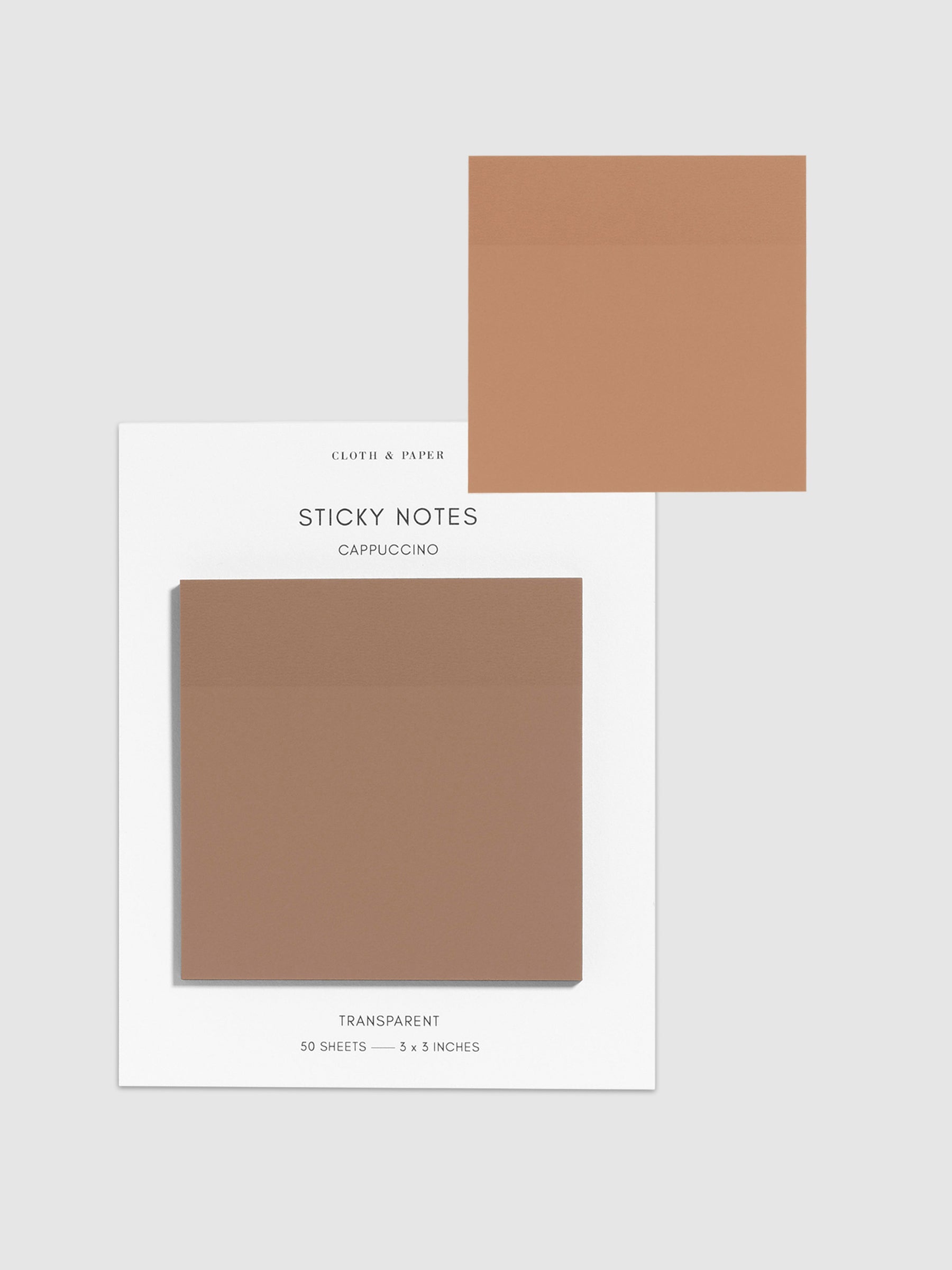 Sticky notes on their backing displayed on a neutral background. One sticky note is displayed on the corner of the backing to show its transparency. Color pictured is Cappuccino.