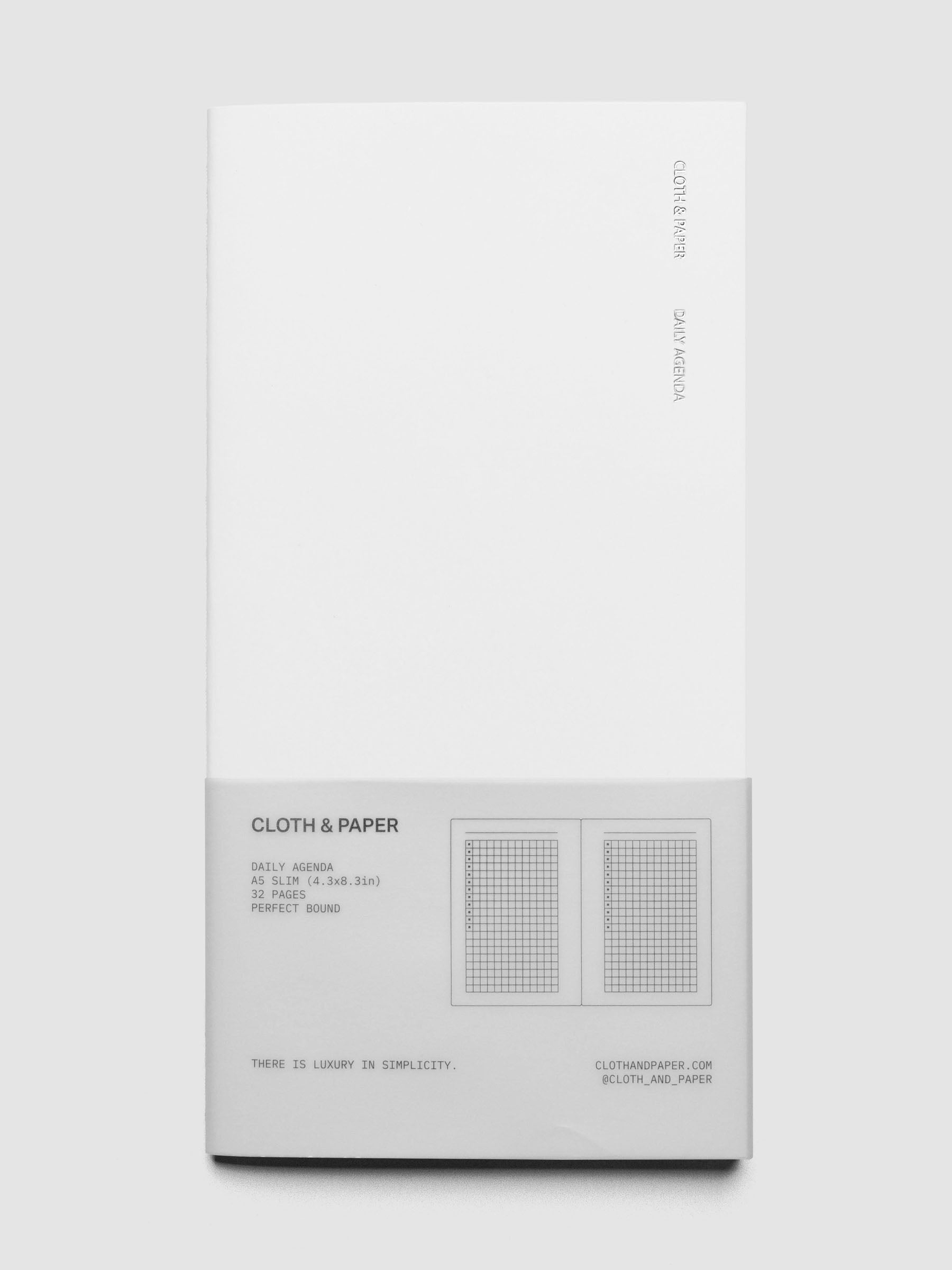 Travel Notebook | A5 Slim | Aspen | Daily Agenda shown closed on a neutral background in packaging.