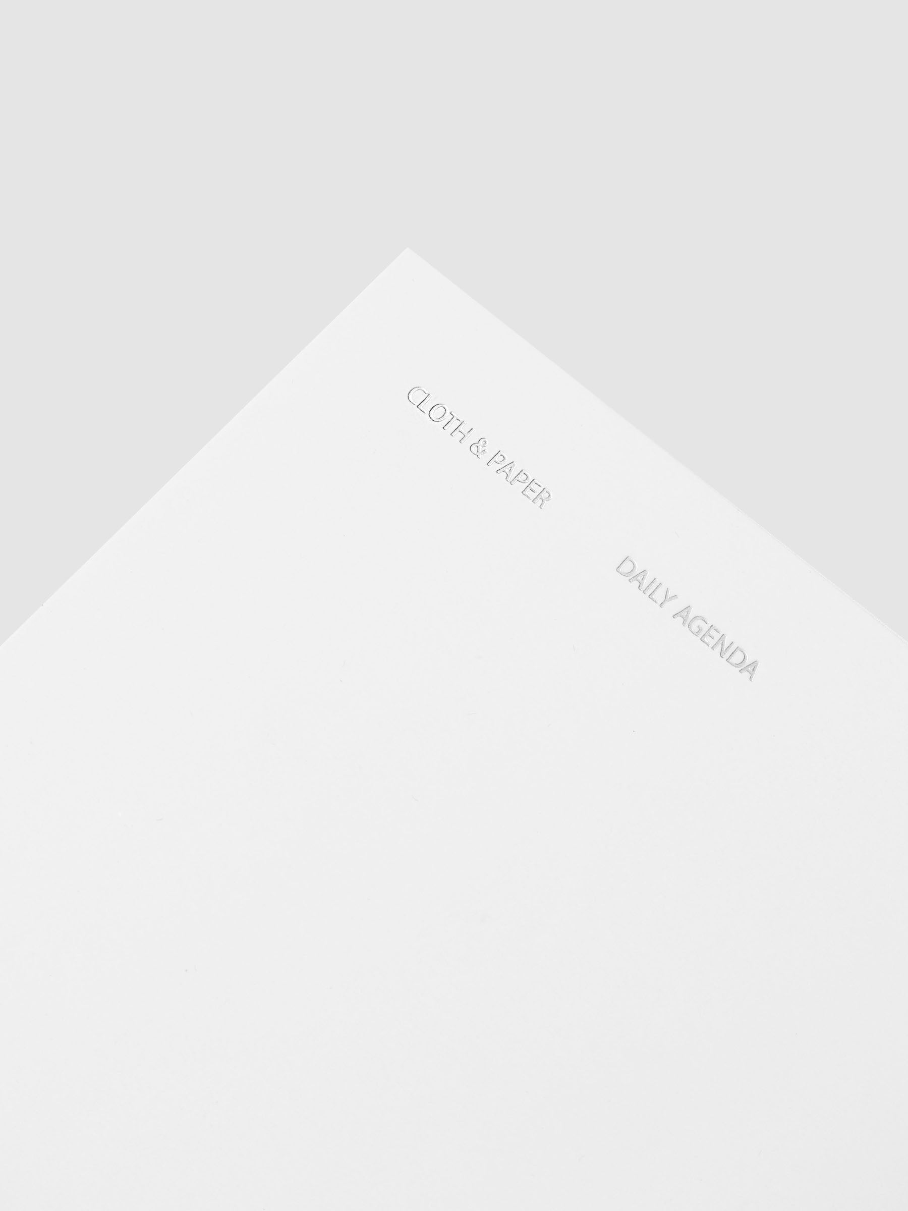 Travel Notebook | A5 Slim | Aspen | Daily Agenda close up of cover foiling details.