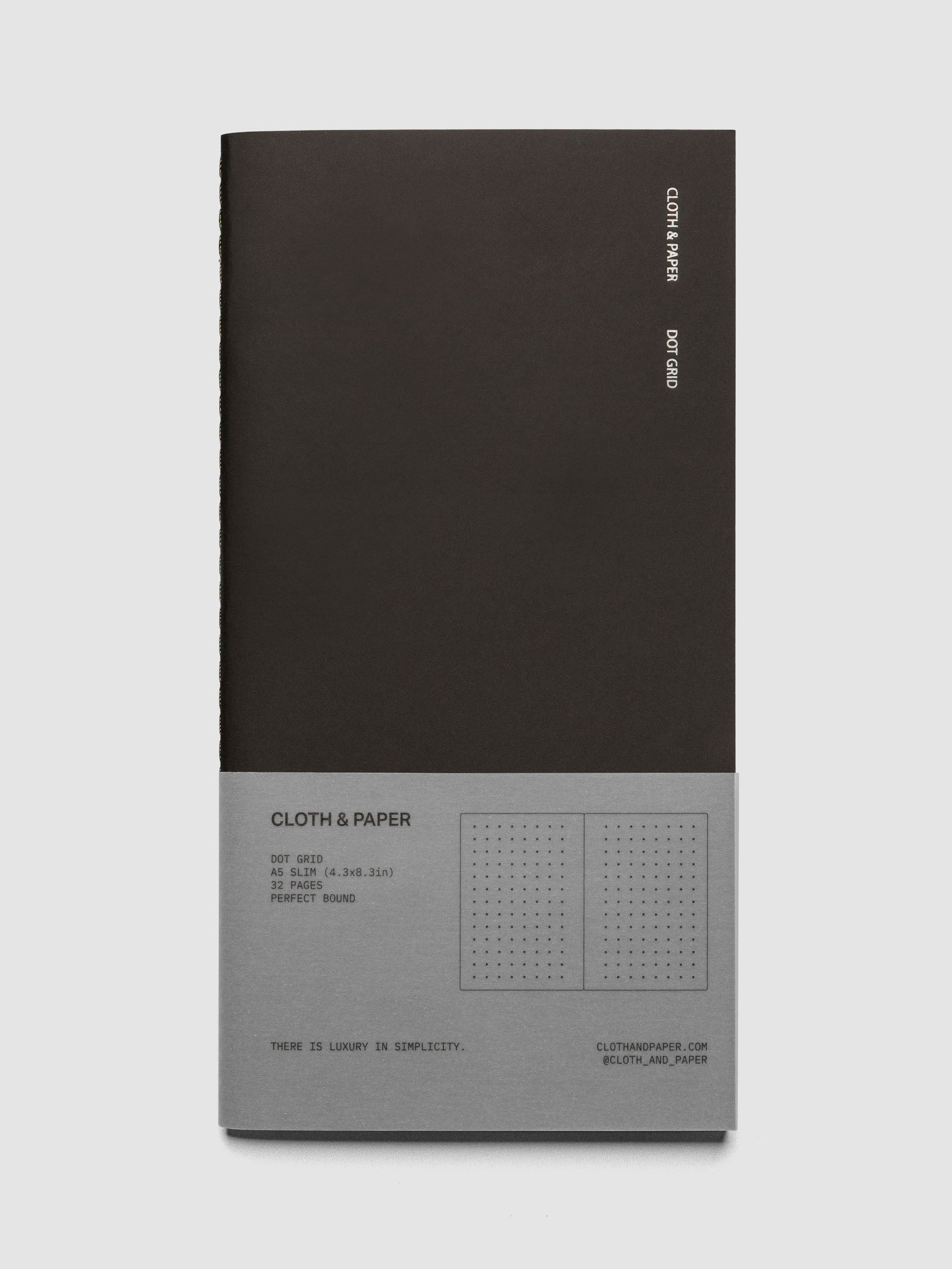 Travel Notebook | A5 Slim | Avant Garde | Dot Grid notebook shown closed on a neutral background in packaging.
