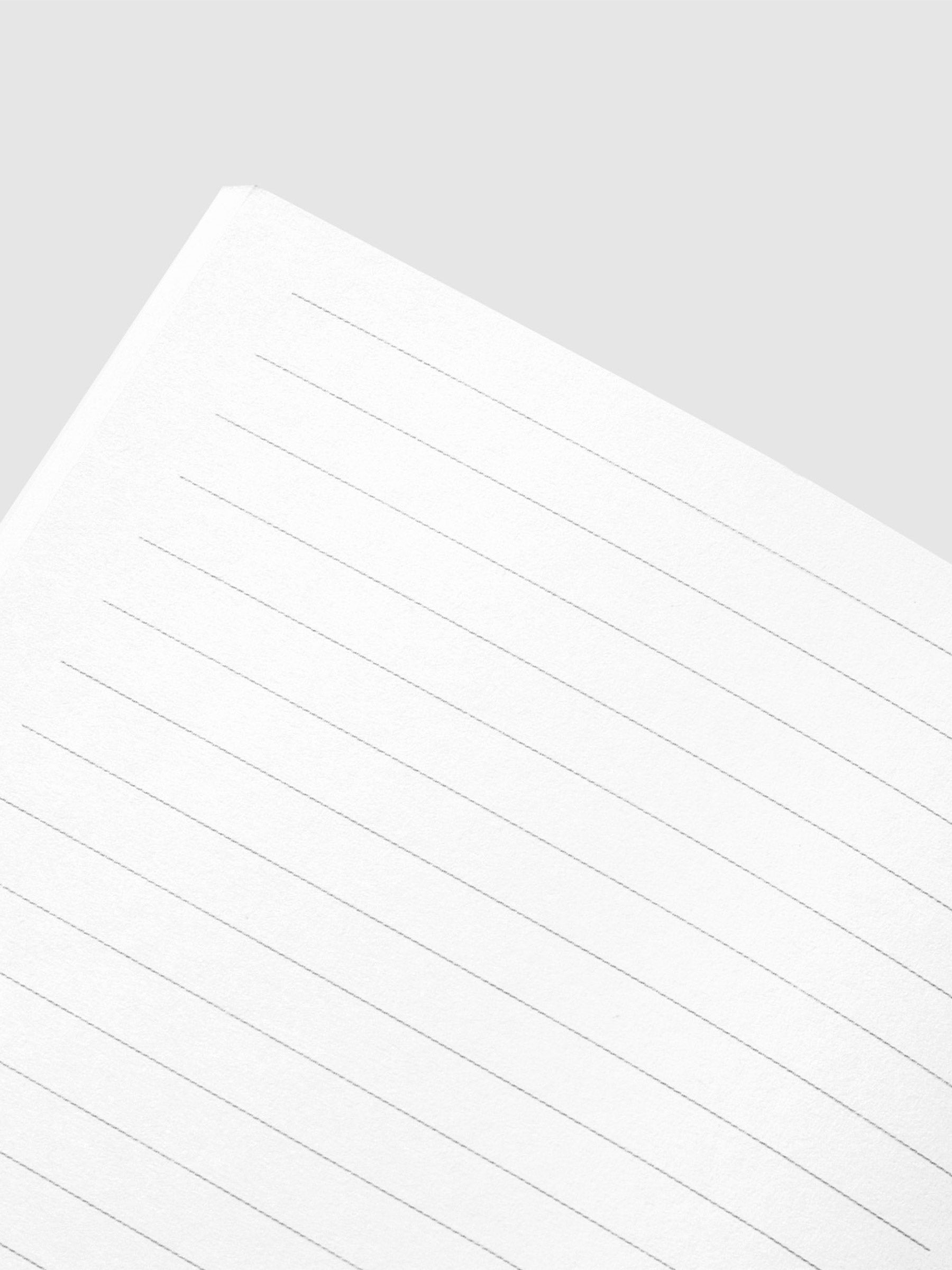 Close up image of the top left of the Lined Notes Agenda Pocket Plus notebook page. The page is displayed on a neutral background