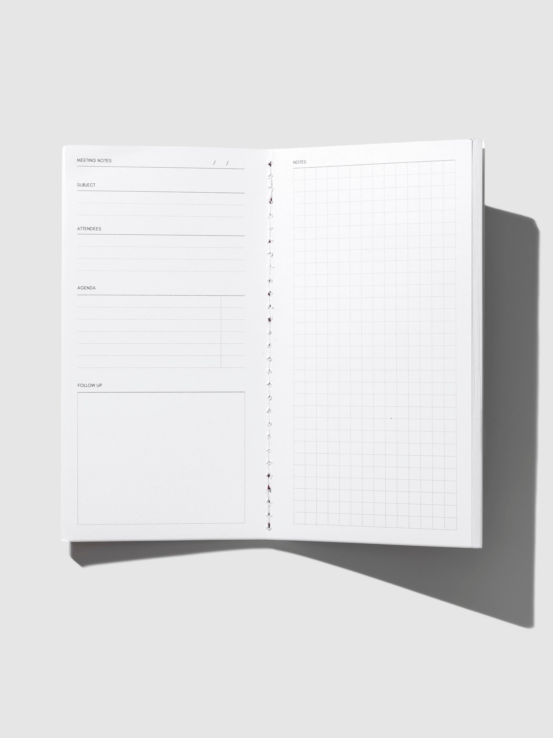 Inside view image of the Meeting Notes Pocket Plus notebook page. The page is displayed on a neutral background.