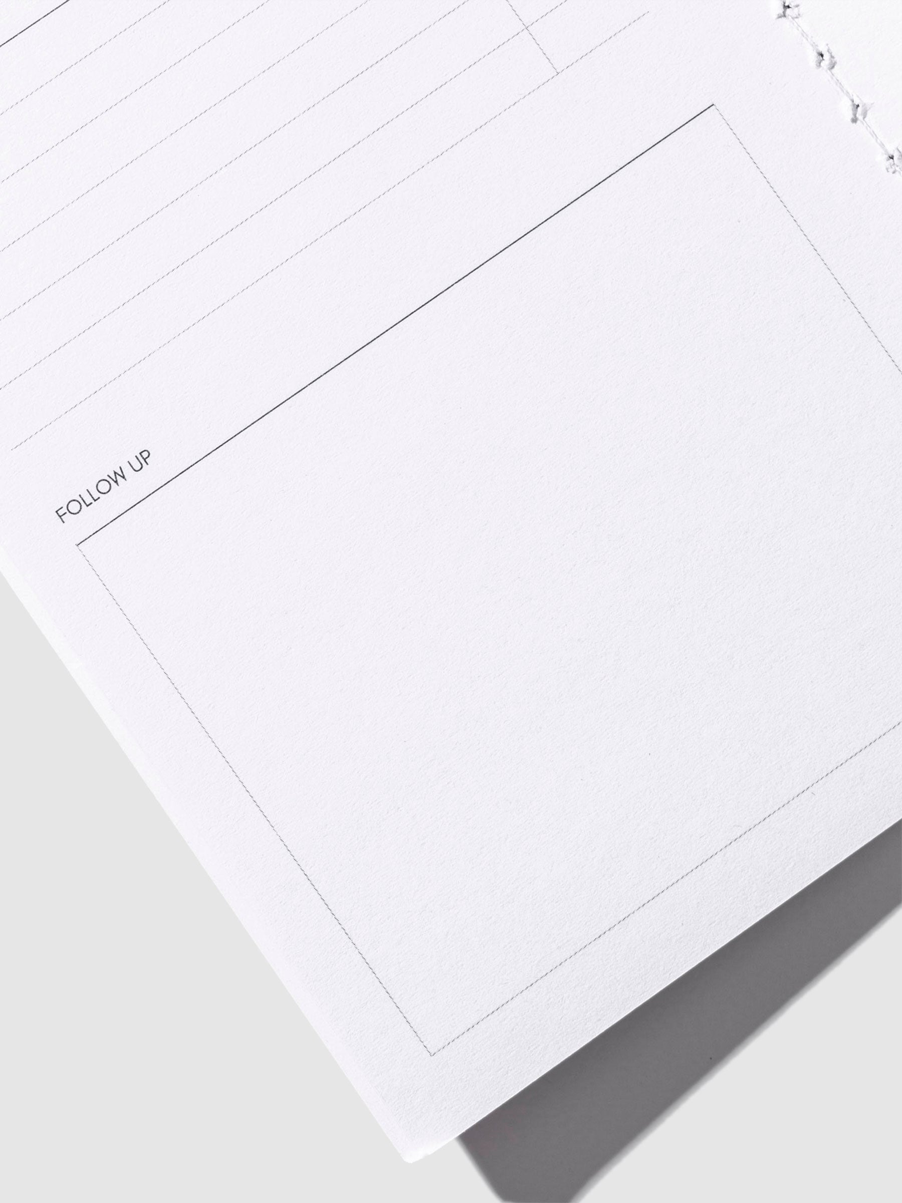 Close up image of the bottom left of the Meeting Notes Pocket Plus notebook page. The page is displayed on a neutral background.