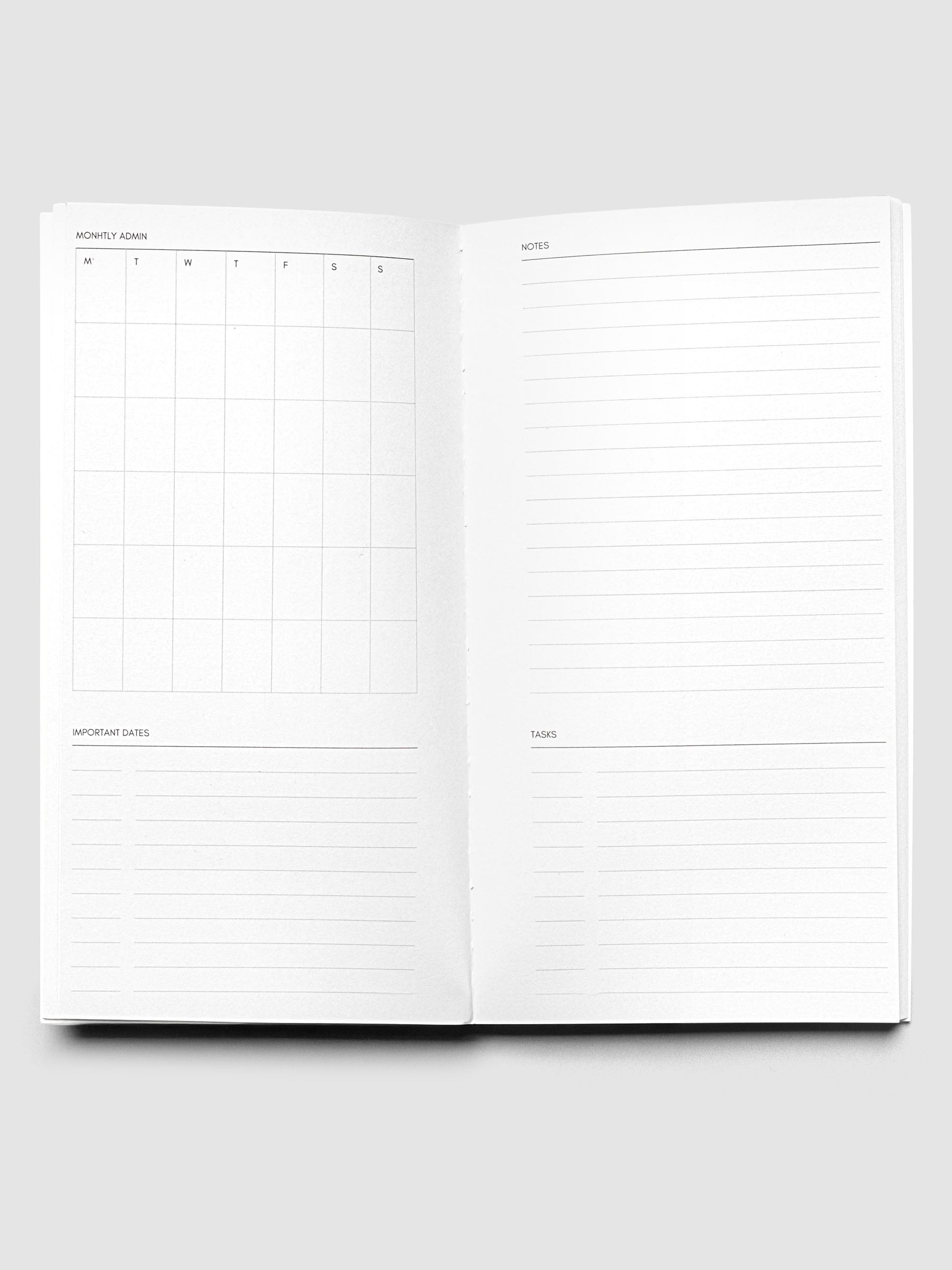 Travel Notebook | Pocket Plus | Lagoon | Monthly Admin shown open displaying a monthly admin layout on the left with a section for important dates and notes and tasks sections on the right page.