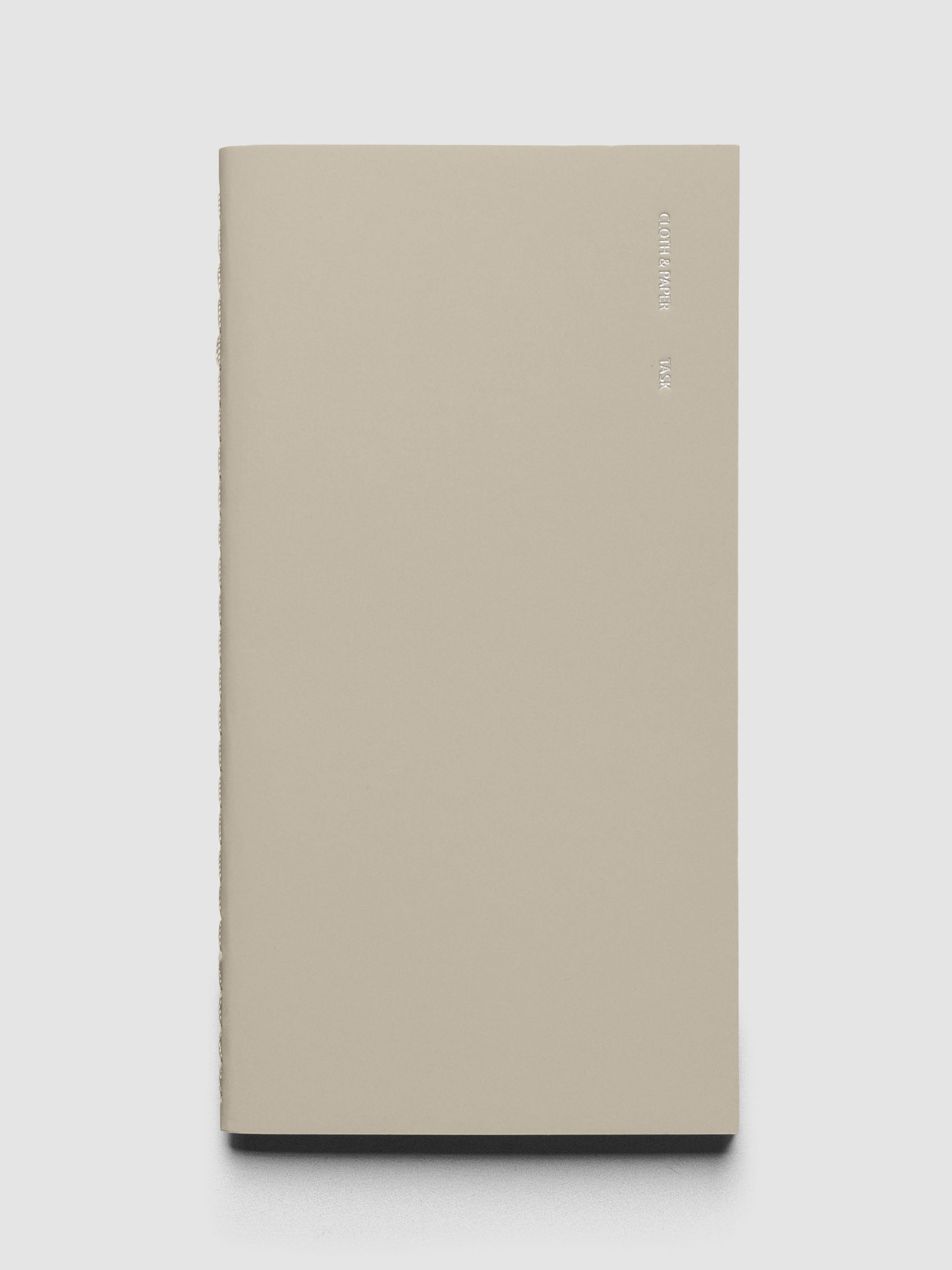 Travel Notebook | Pocket Plus | Ristretto | Task shown closed on a neutral background.