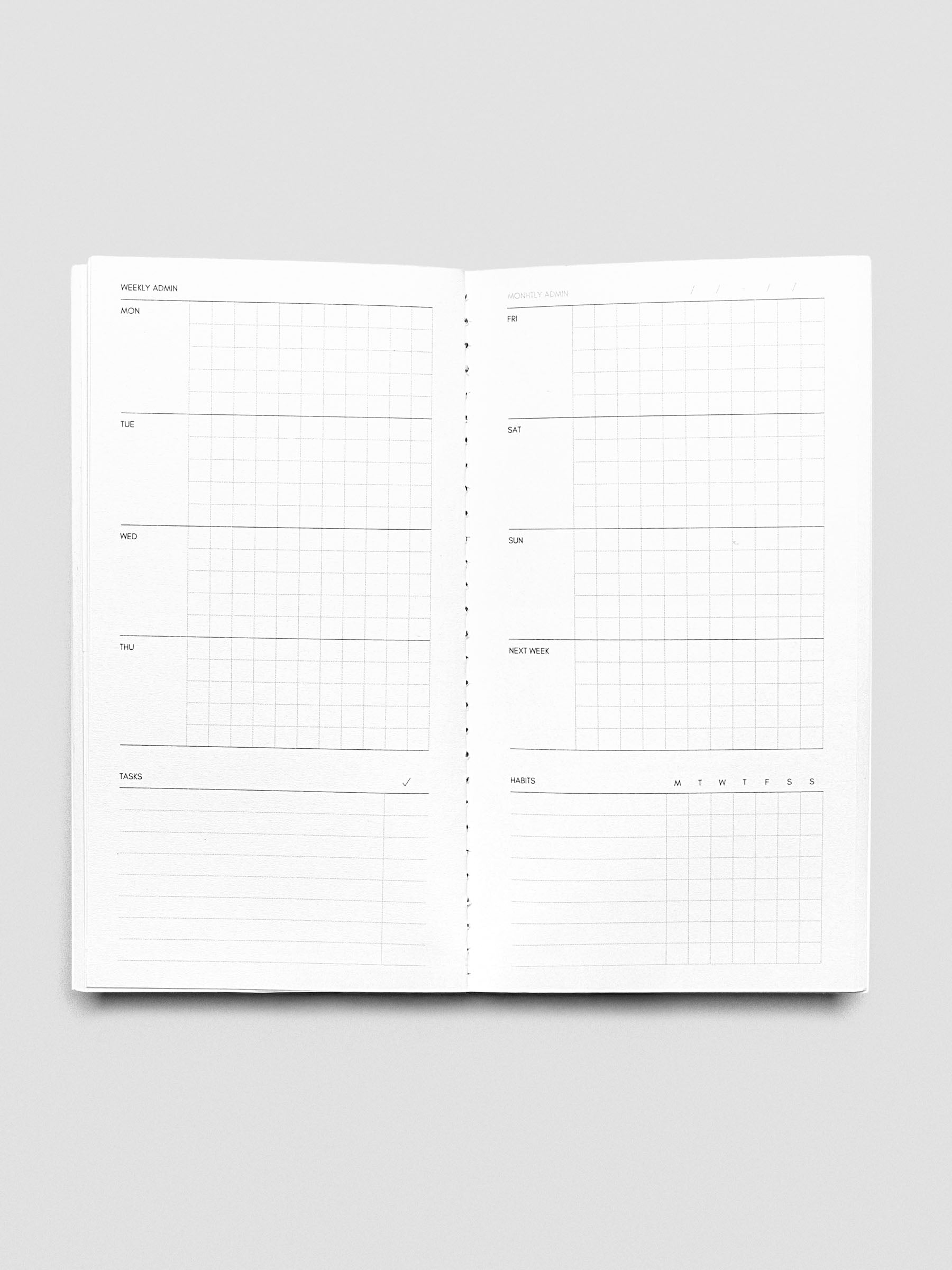 Pocket Plus Travel Notebook shown open displaying the Weekly Admin pages.