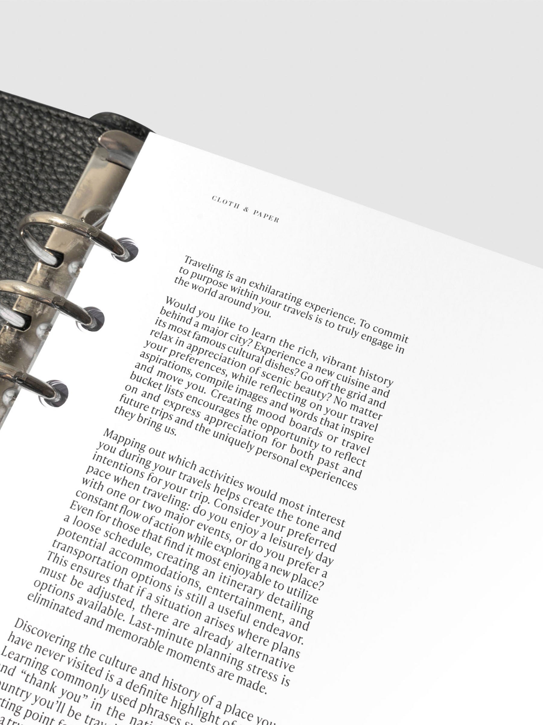 Dashboard shown in use inside a black leather agenda.