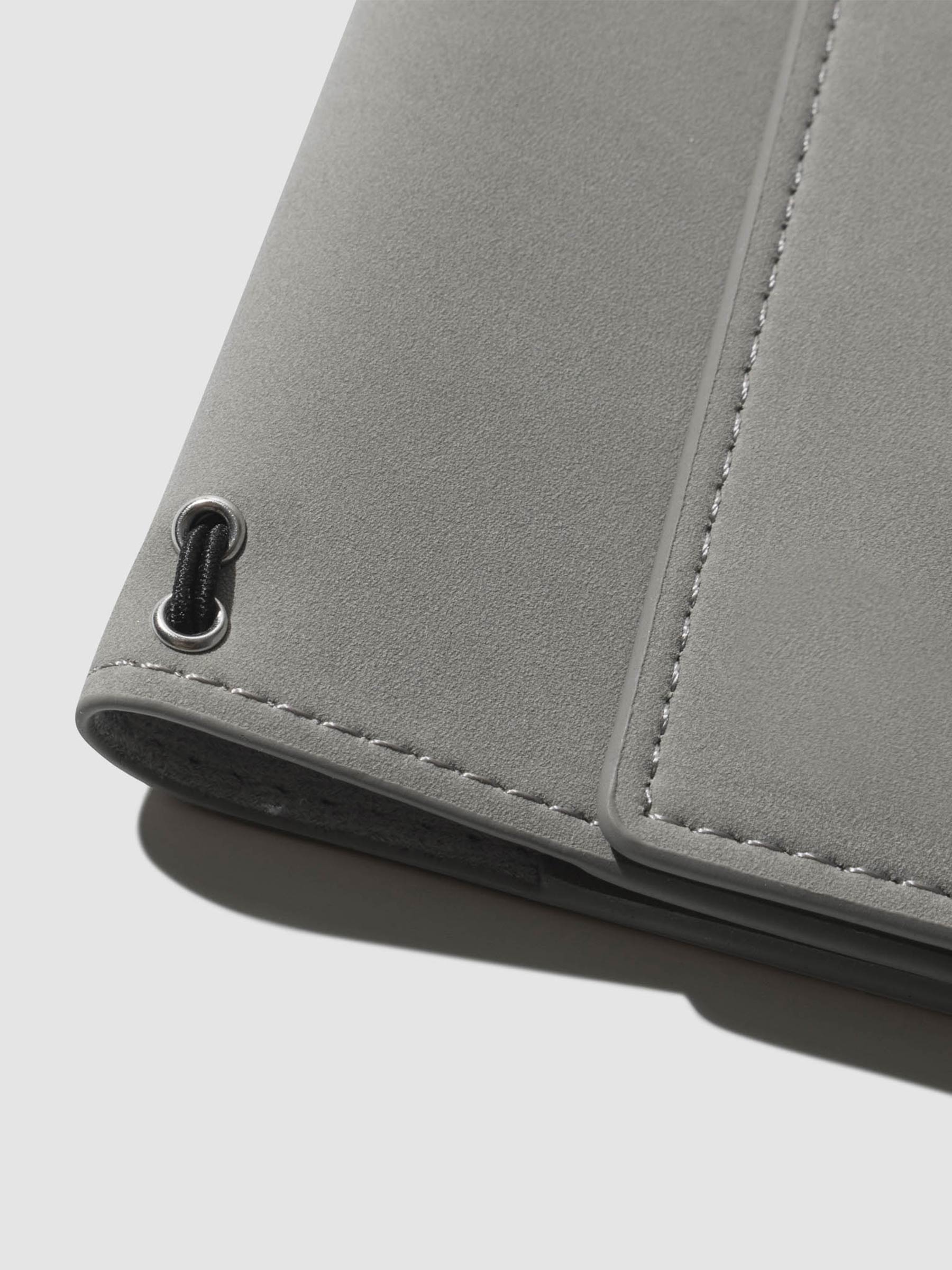 Closeup of cover on a neutral background.