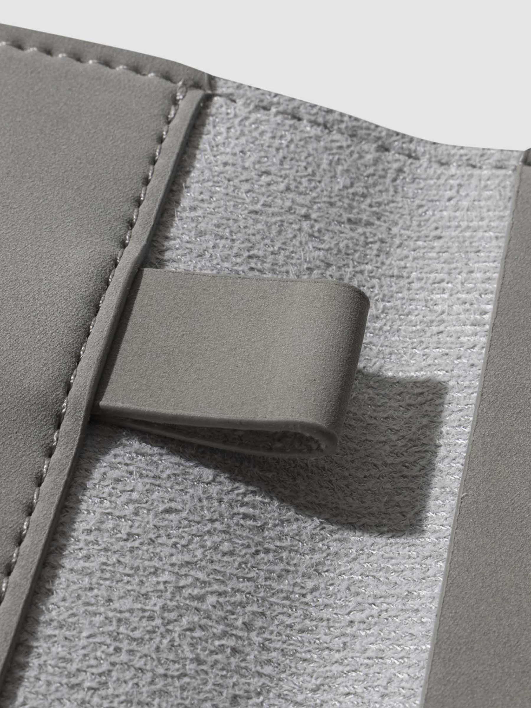 Closeup of pen loop inside cover.