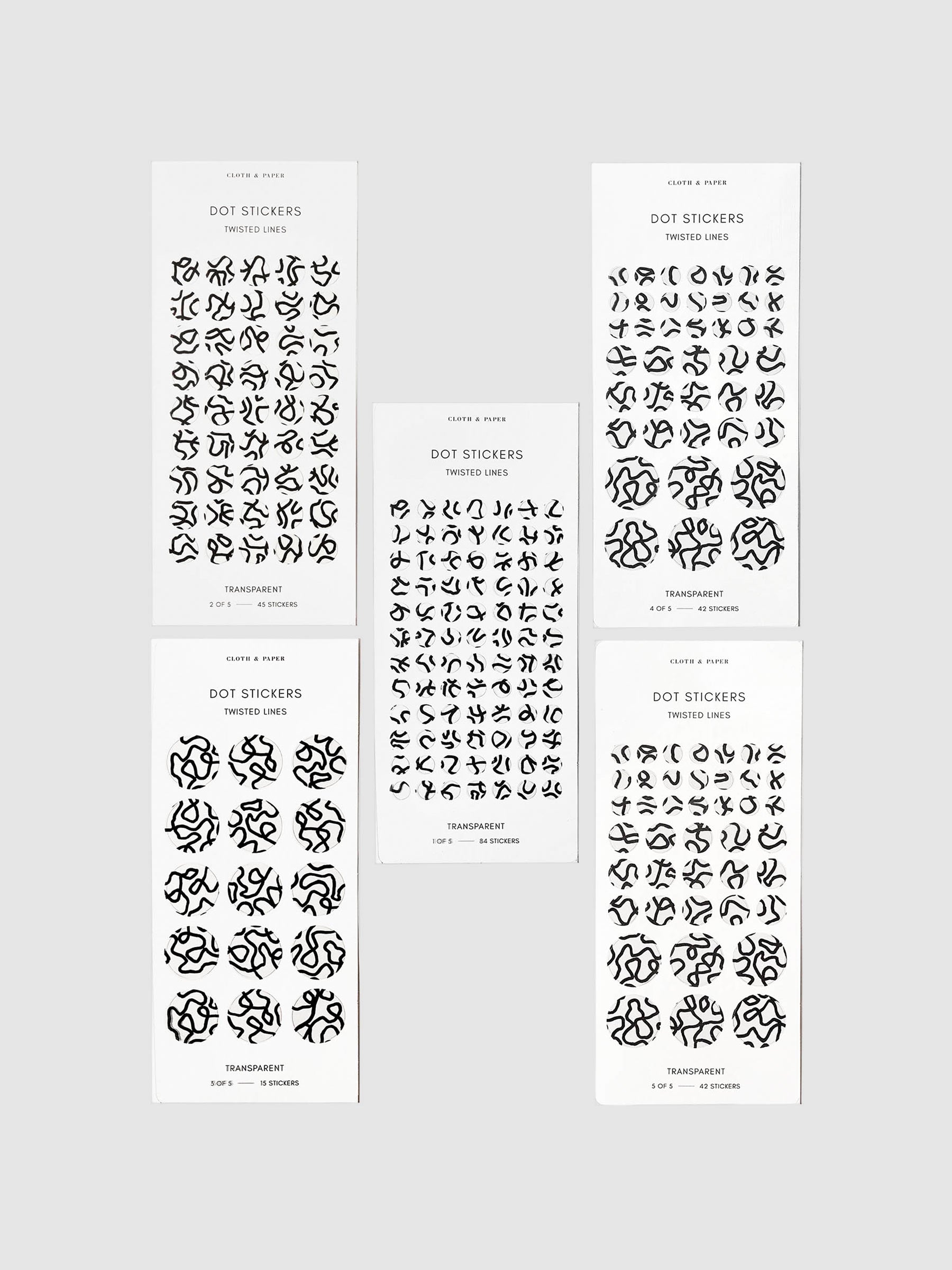 Twisted Lines Dot Sticker Set, Transparent, Cloth and Paper. Set of five sheets of stickers displayed on a neutral background.
