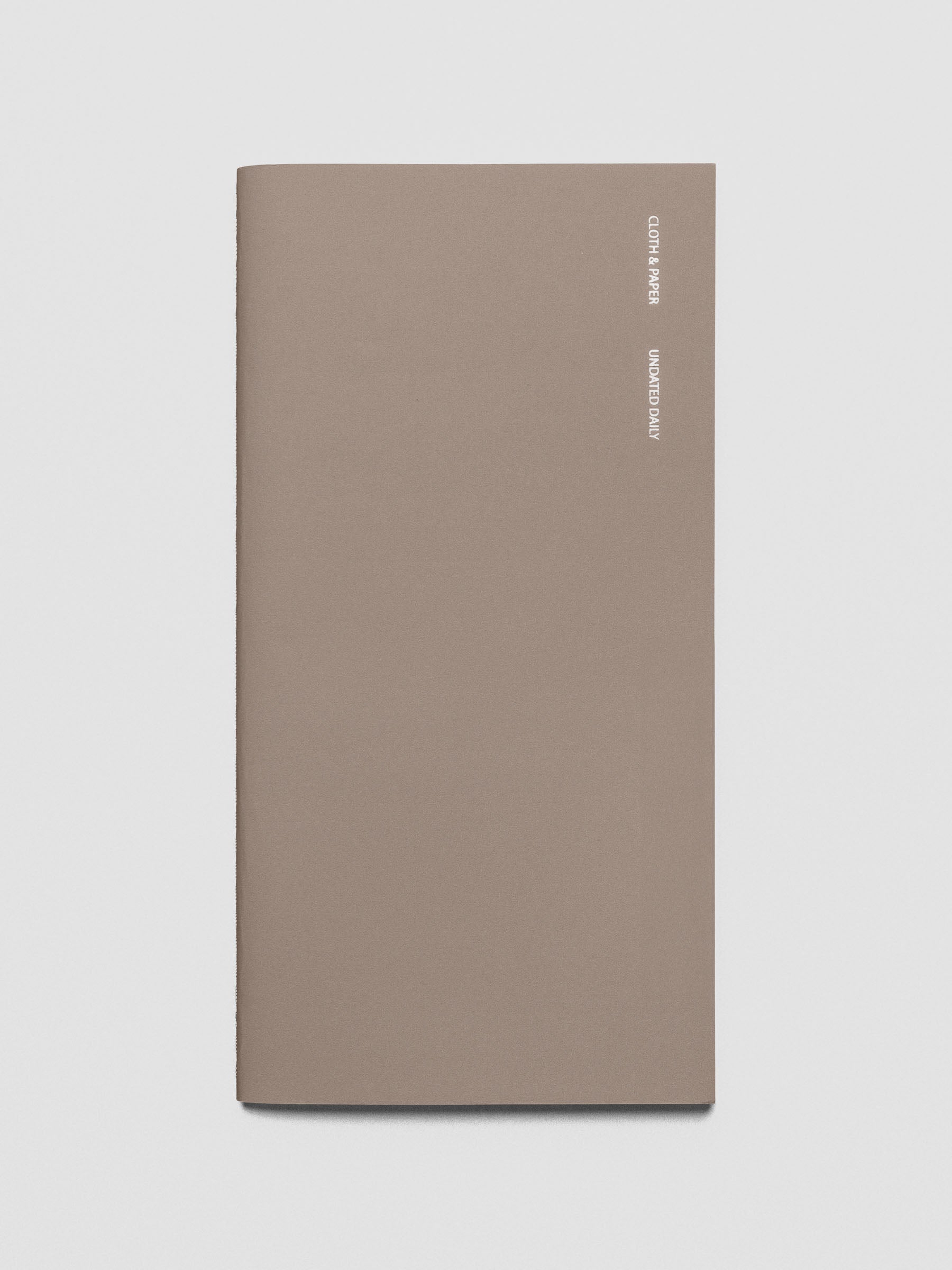 Travel Notebook in size A5 Slim in color Verona with Undated Daily pages shown from the front as a close up.