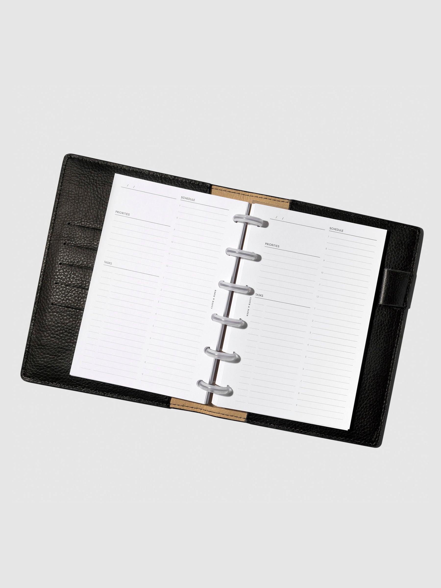 Insert in use inside a black leather planner.