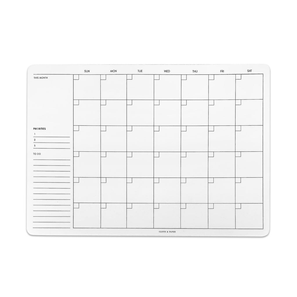 Undated Monthly Desk Pad, A5, Cloth and Paper. Desk pad displayed on a white background.