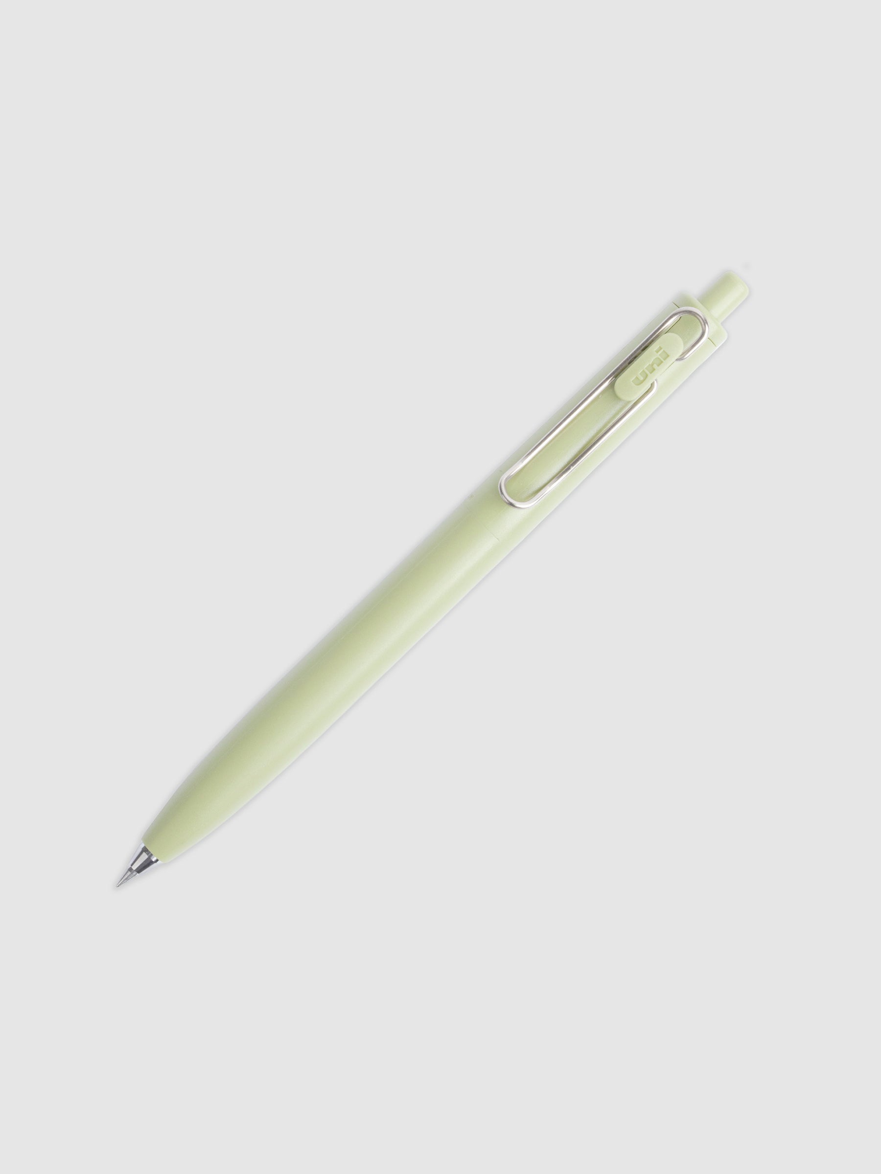 Khaki pen turned to the right against a neutral background.