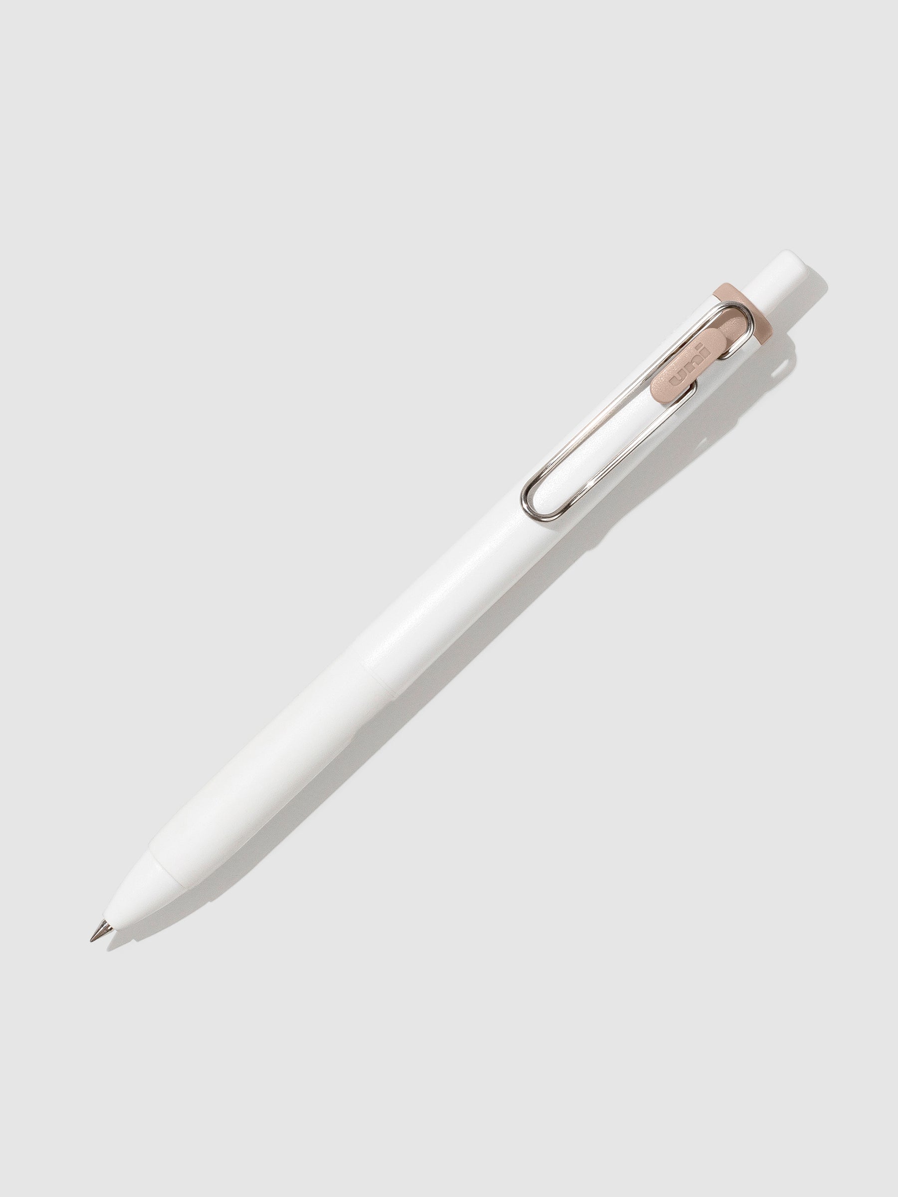 Pen tilted slightly to the right on a neutral background. Color pictured is Cappuccino Brown.