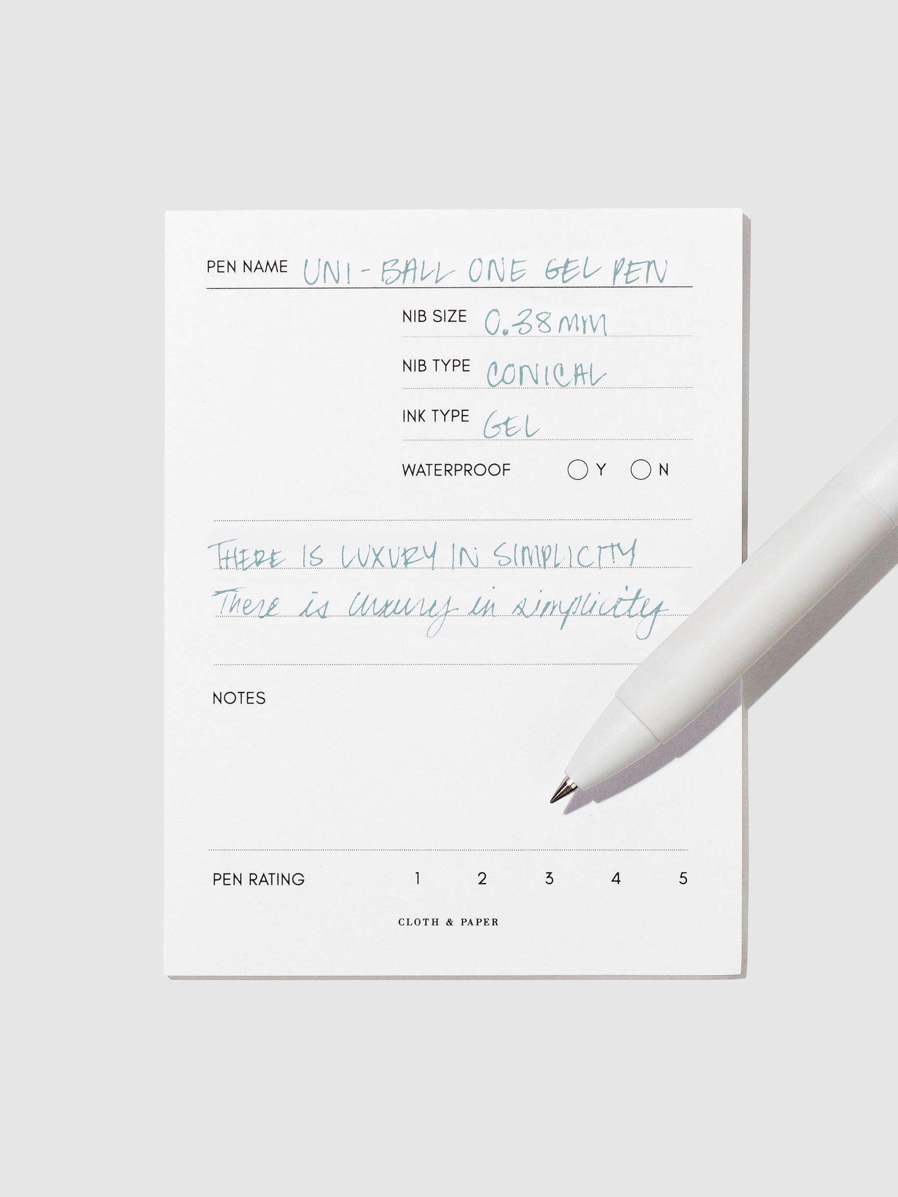 Pen tilted slightly to the right on a neutral background. Color pictured is Nemophila Blue.