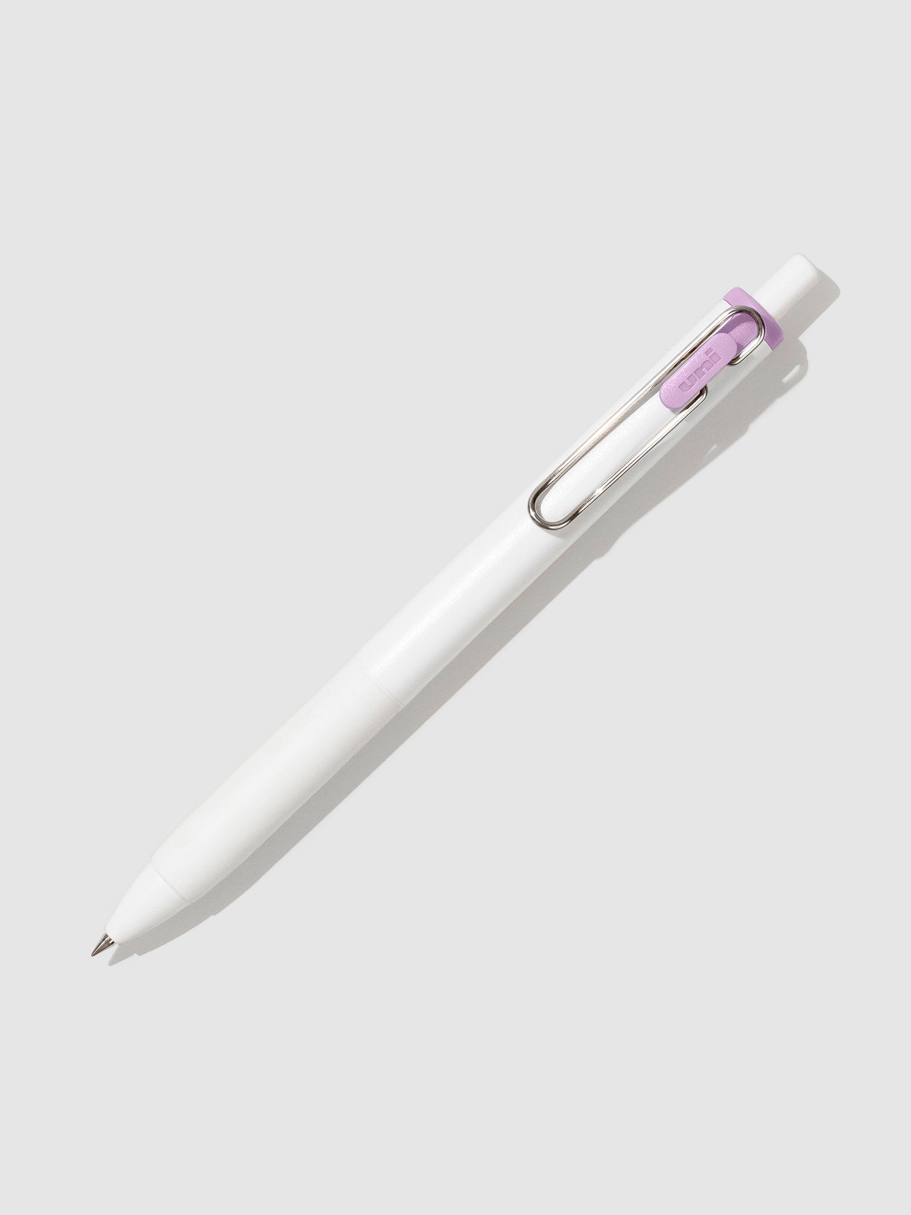 Pen tilted slightly to the right on a neutral background. Color pictured is Plum Purple.
