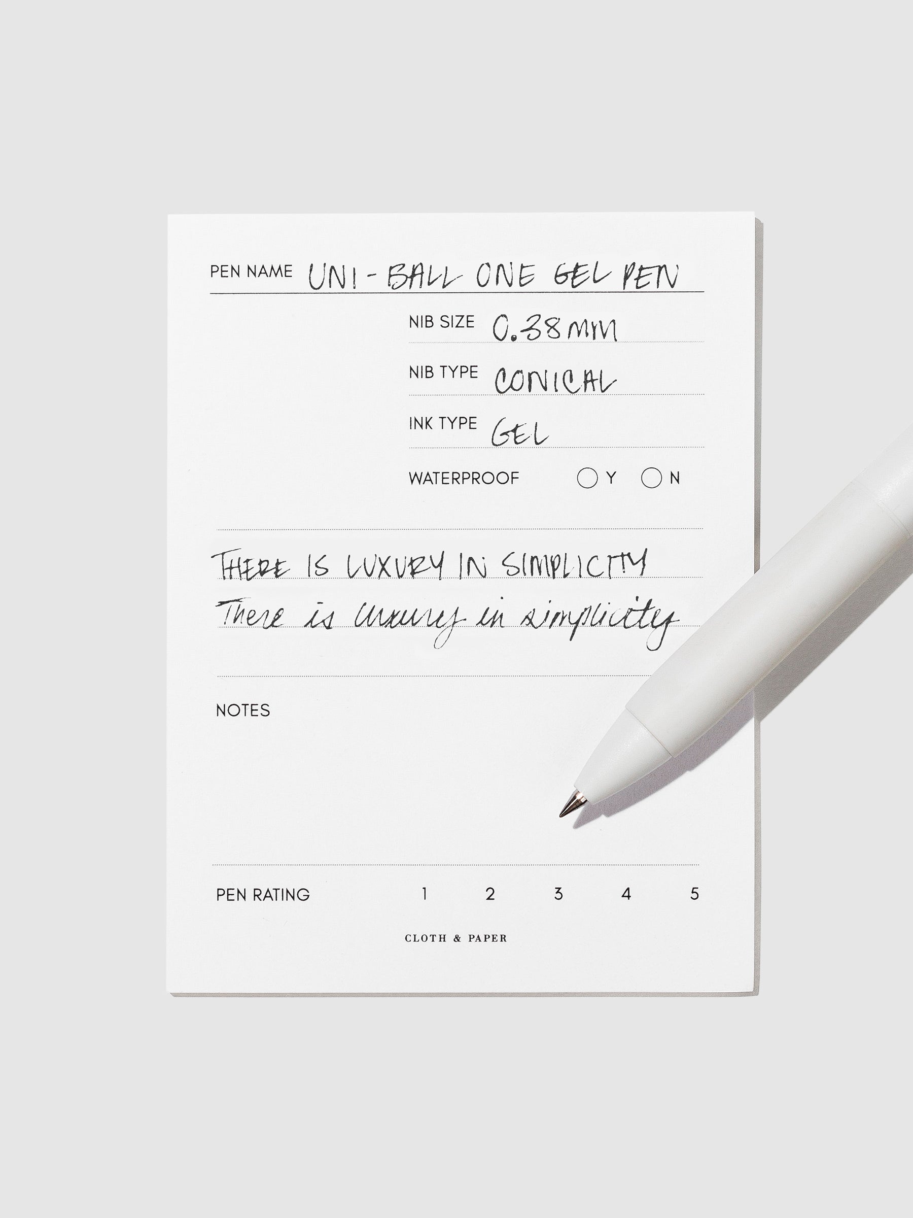 Pen tilted slightly to the right on a neutral background. Color pictured is Black.