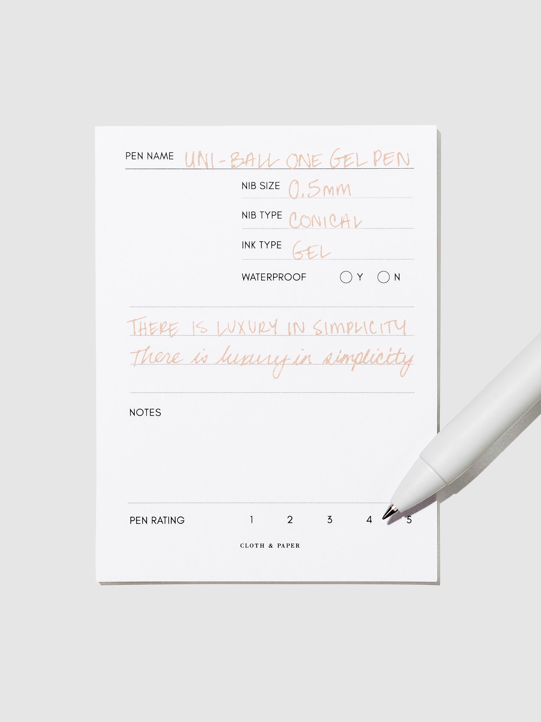 Pen tilted slightly to the right on a neutral background. Color pictured is Cappuccino Brown.