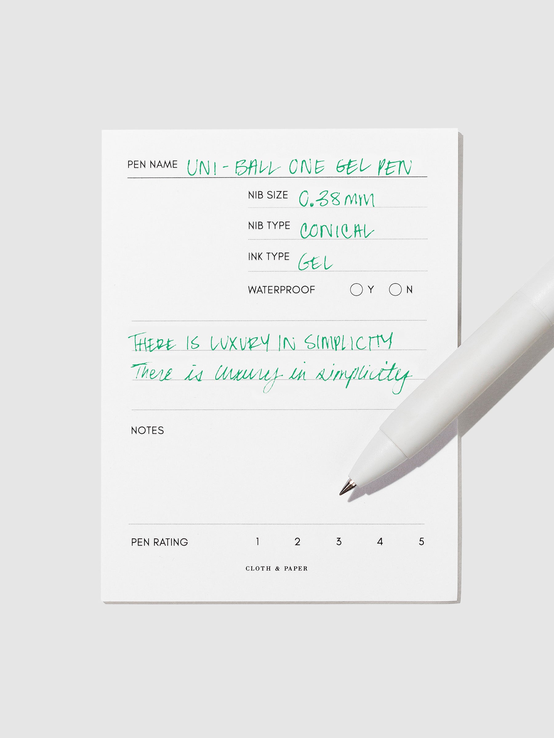 Pen tilted slightly to the right on a neutral background. Color pictured is Green.