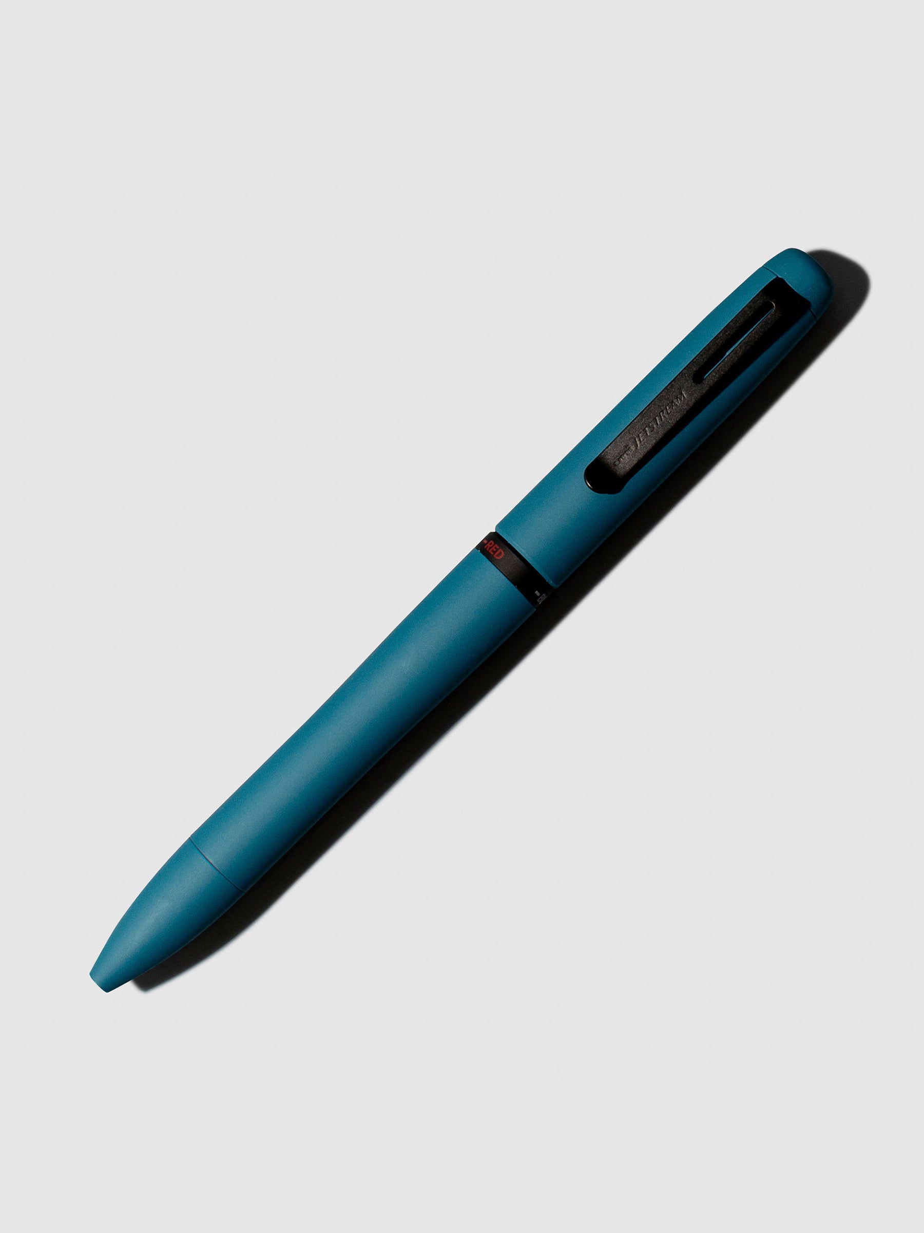 Pen shown on a neutral background with its tip retracted. Color shown is Ivy Green.