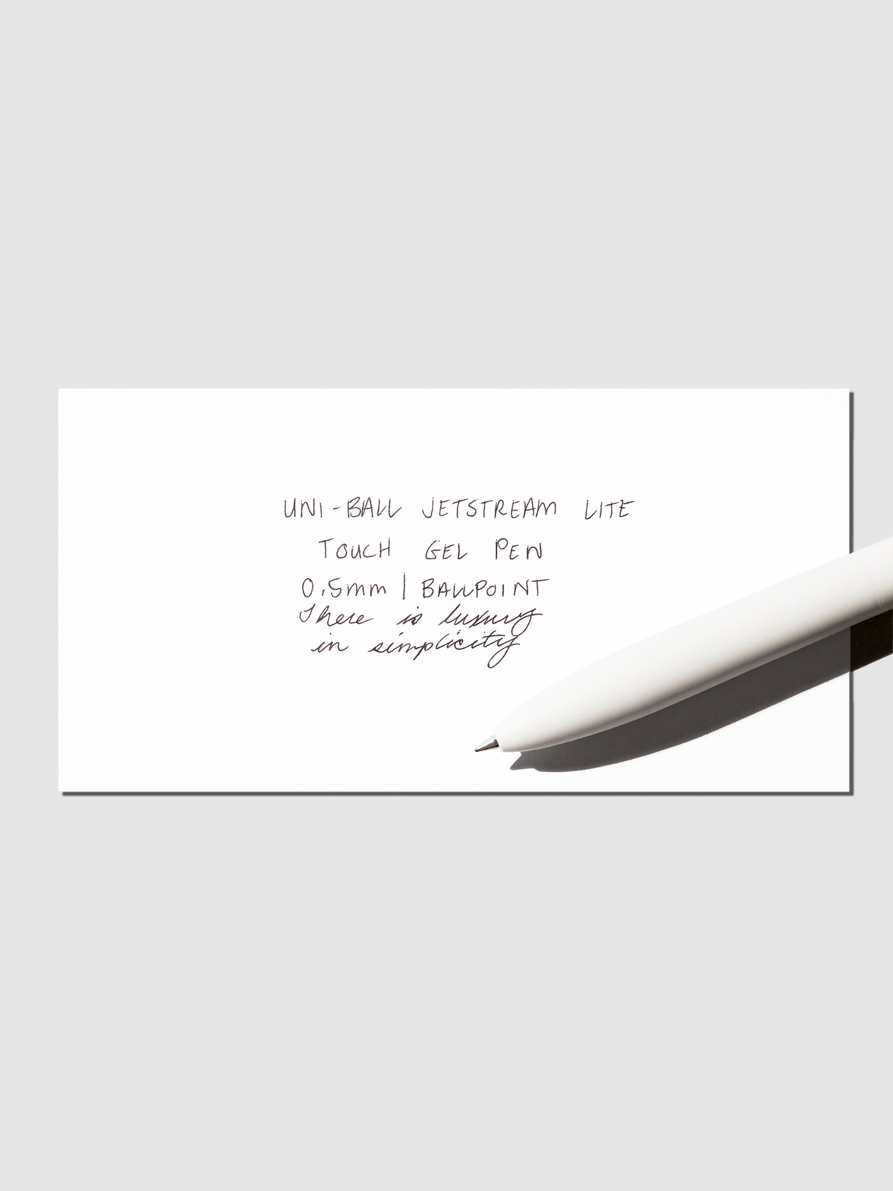 Image shows a pen test sheet ofthe Uni-ball Jetstream LiteTouch Gel Pen in Shell White.