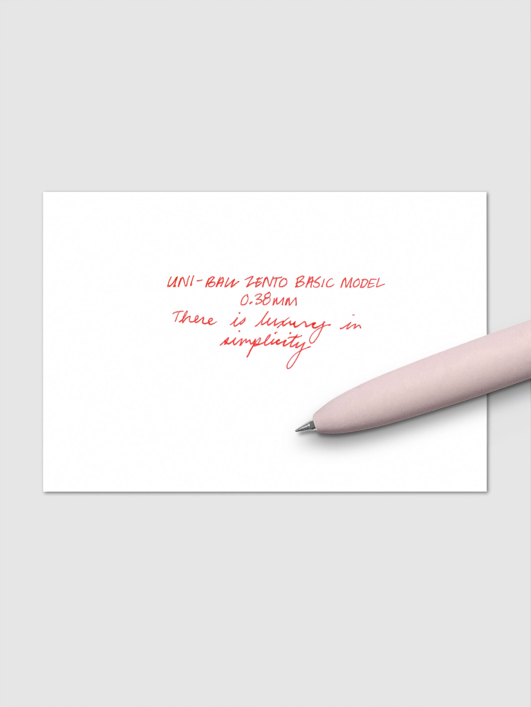 Handwritten writing sample using the Uni-ball Zento Basic Model Pen in Red with nib size 0.38 mm.