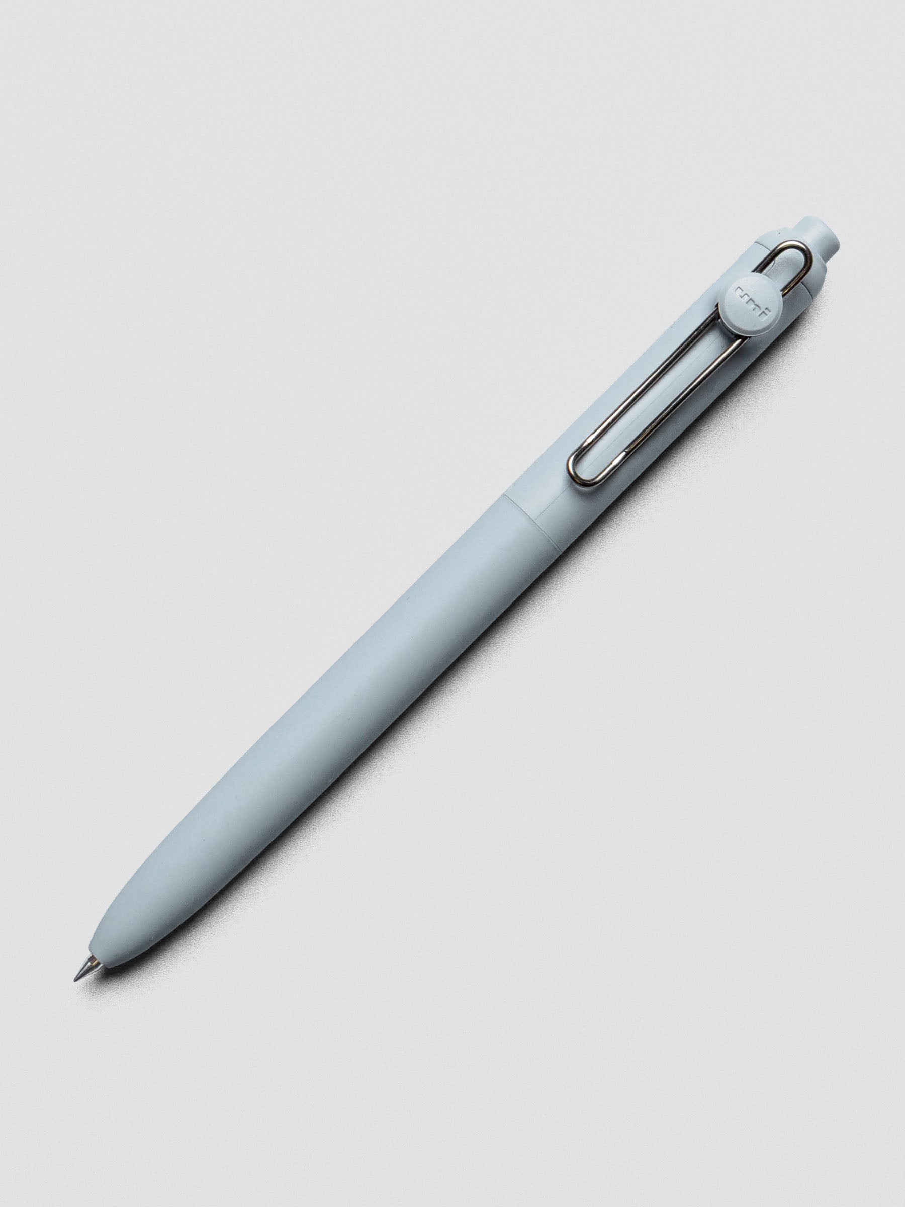 Light blue pen with a silver clip shown at an angle.