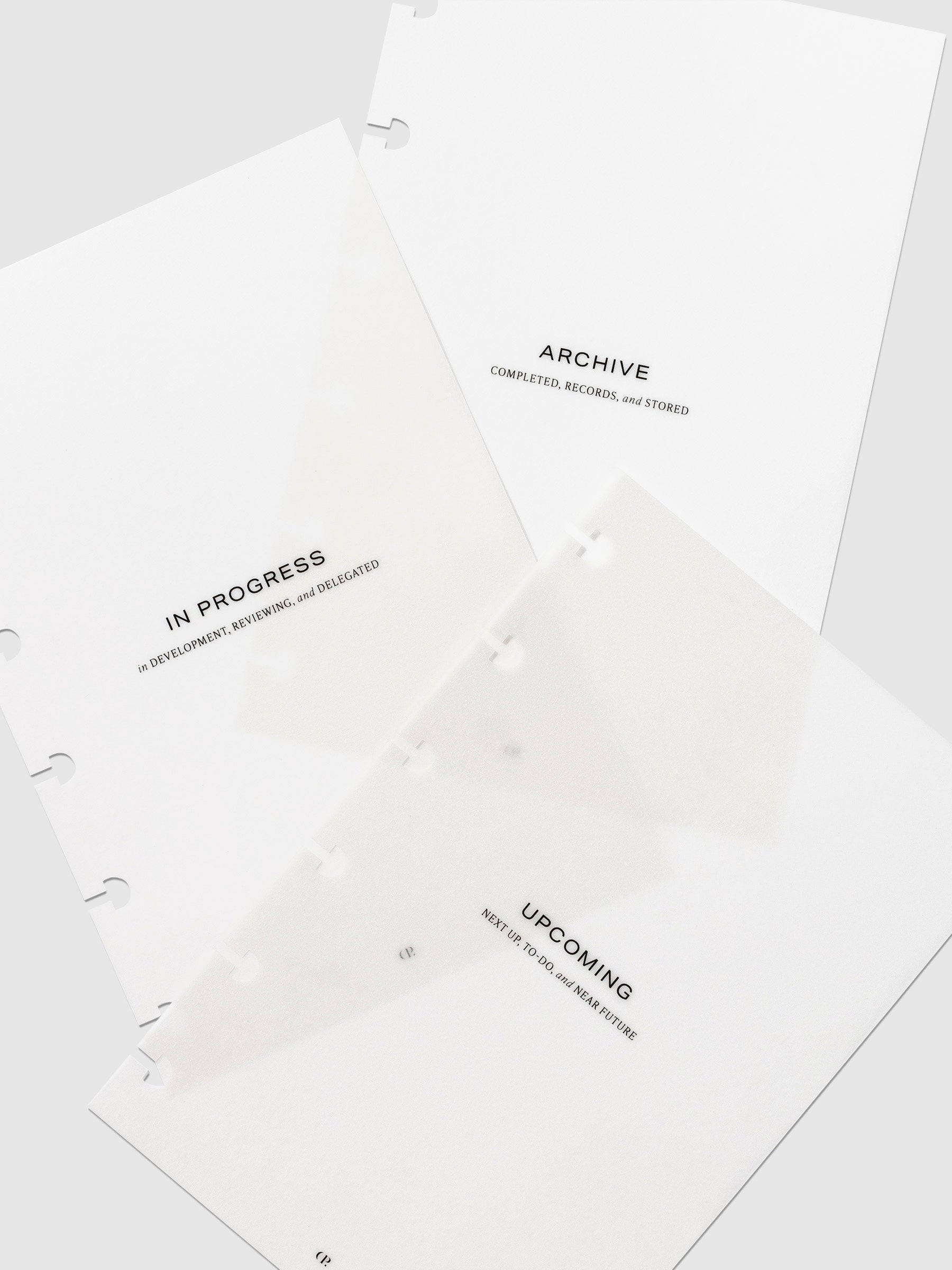 Volume 1 | Lifestyle dashboards arranged on a neutral background. From top to bottom, they read - "upcoming" "in progress" and "archive."