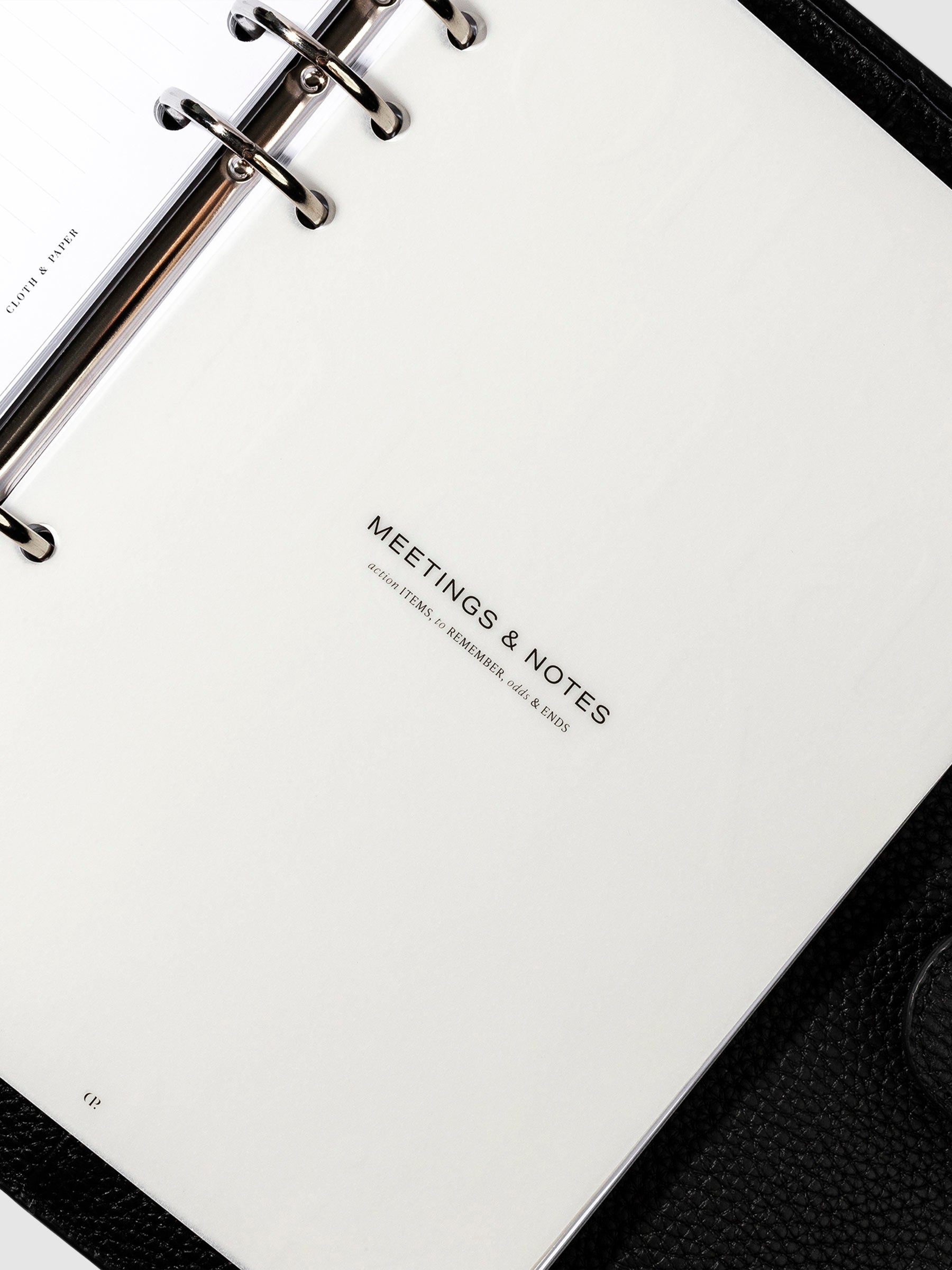 Meetings and Notes dashboard in use inside a leather planner.