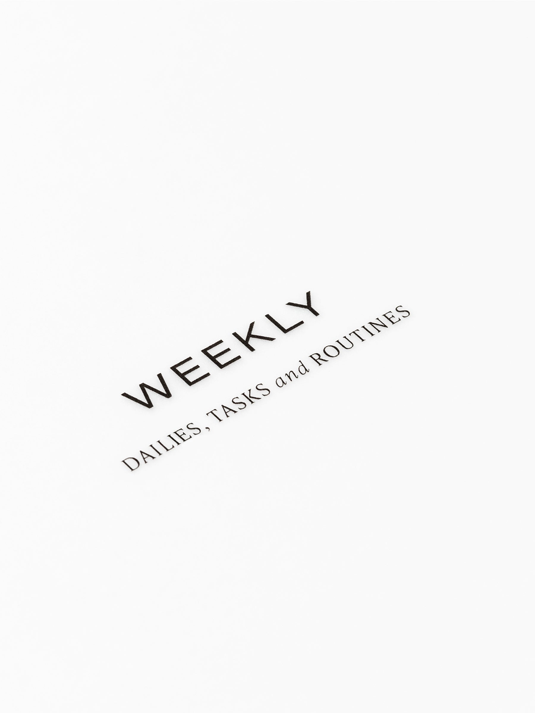 Closeup of text reading "weekly | dailies, tasks, and routines"