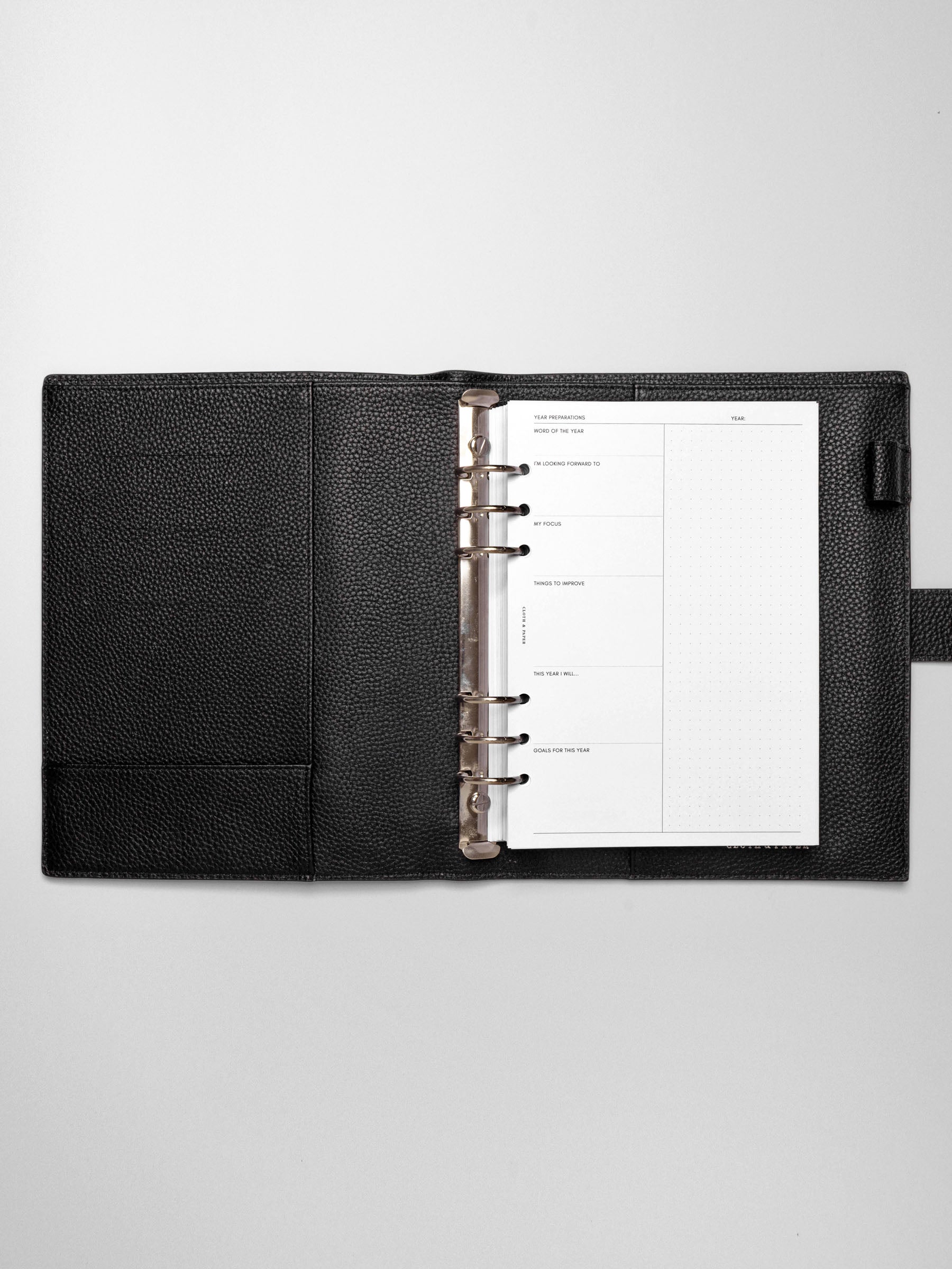Insert in use inside a black leather planner.