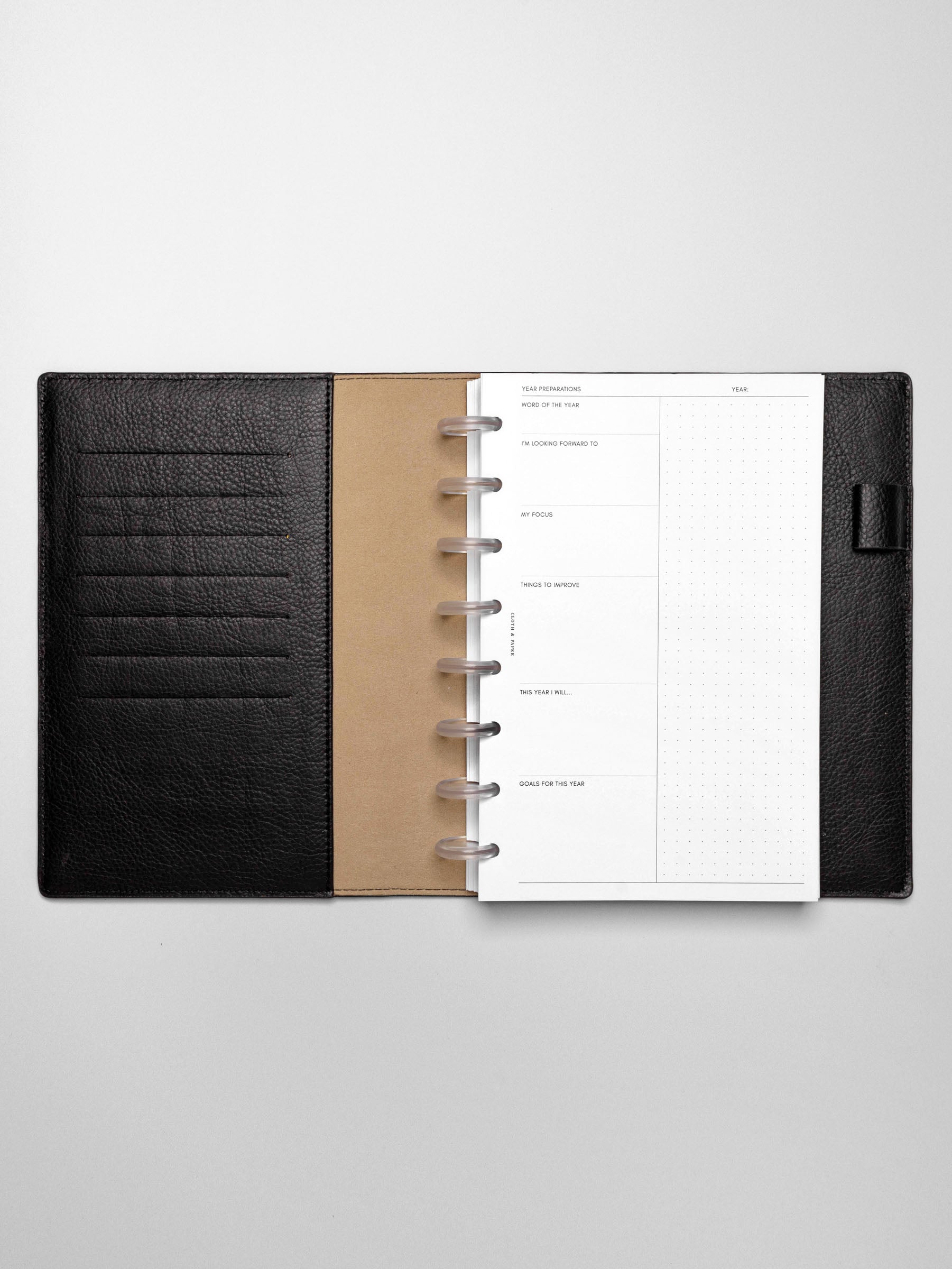Insert in use inside a black leather planner.