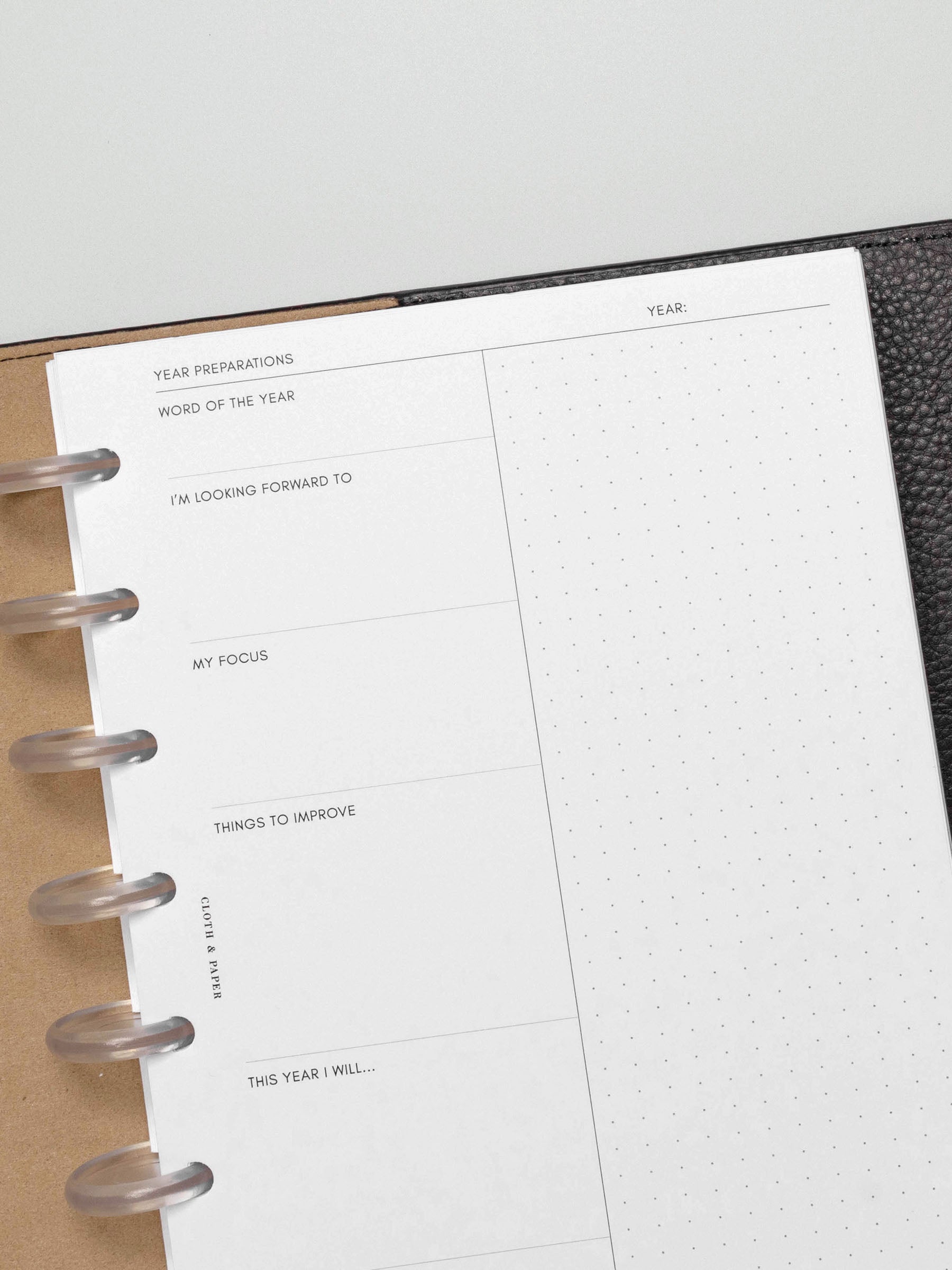 Insert in use inside a black leather planner.
