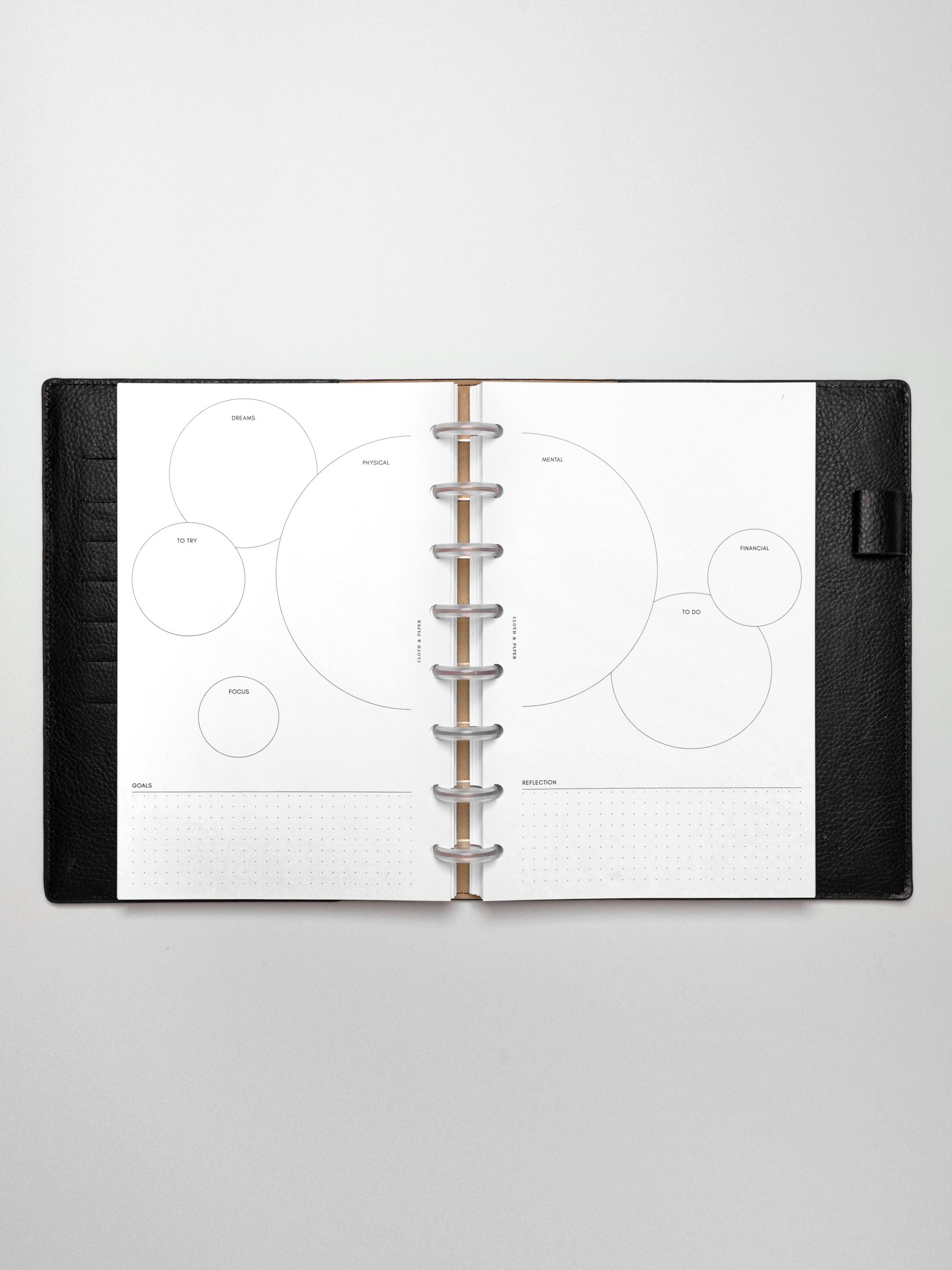 Insert in use inside a black leather planner.